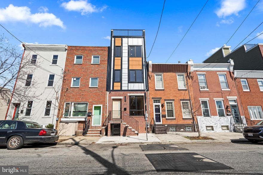 Welcome to 2439 E Huntingdon & 2440 E Harold Street, brand-new construction single-family homes in Fishtown with a 10-year tax abatement, 3 bedrooms, 2.5 bathrooms. Huntingdon, nearly 2,400 square feet of finished living space has an open-concept first floor features high ceilings, engineered hardwood floors, and a spacious living and dining area that flows into a modern chef’s kitchen with a center island cooktop, wine cooler, smart appliances, sleek cabinetry, and under-cabinet lighting. Sliding glass doors lead to a private rear patio, ideal for grilling, entertaining, or outdoor dining. The second floor includes two large bedrooms and a stylish full bathroom. The third floor is dedicated to the primary suite, complete with ample closet space and a spa-style bathroom with heated floors. A laundry area is conveniently located just outside the primary bedroom. One of the home’s standout features is the expansive rooftop deck with panoramic Philadelphia skyline views, accessed by a top-floor wet bar, making it the perfect setup for entertaining. The finished basement provides flexible bonus space for a second living room, home office, gym, or possible 4th bedroom / guest suite, and includes its own half bathroom. Additional upgrades include dual-zone HVAC, integrated security and surveillance, glass-break, door-break, and motion sensors, motorized blinds in the living room, and dimmer switches throughout. Located near Aramingo Square Park and within walking distance to Fishtown restaurants, coffee shops, fitness studios, and grocery stores, this home offers the best of new construction living in Philadelphia with easy access to neighborhood amenities. Move-in ready and complete, 2439 E Huntingdon Street is ready for its first owner. Schedule your showing today.