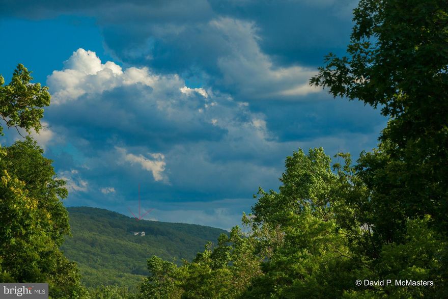 Below Appraisal. On market  after 5 mo. Buyer unable to perform. Panoramic 4 state view - striking skyscapes   private - balance of woodland-open-gardens. Ample guest,entertainment, game table space.  Mahogany floors, granite, wet bar, fully finished basement, X-lg. garage, 3 zone heat/cool, energy efficient, low maintenance. Nearby A.T. & Shenandoah River access & shopping. Min. Marc, MD, VA..