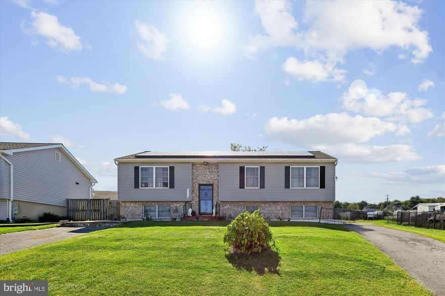 Discover this beautifully remodeled 4-bedroom, 3-bathroom home, a true gem offering a blend of style and function. The main level features a separate living room and dining room, a bright family room addition, and a modern kitchen with stainless steel appliances. Hardwood herringbone floors and fresh paint enhance the home's inviting feel, while skylights fill the space with natural light.

The versatile, fully finished basement includes a spacious fourth bedroom, an office, and a full bathroom, perfect for guests or an in-law suite. Outside, the fenced-in backyard is an entertainer's paradise with a double-level deck and multiple sliding doors for seamless indoor-outdoor living. With two driveways and solar panels, this home combines comfort, practicality, and efficiency. It truly has it all—come see it today!