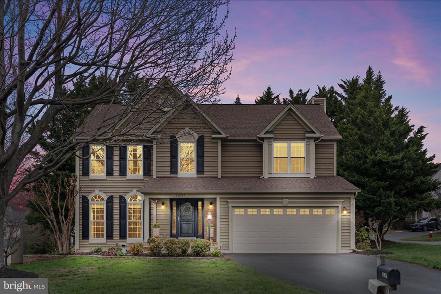 Situated on a quiet street tucked between two private cul-de-sacs, this extraordinary home began as the standard Stanford model by M/I Homes and was masterfully reimagined by the original owners during construction, resulting in a floor plan rarely found and truly one of a kind. Beautifully maintained and thoughtfully improved over the years, it reflects exceptional pride of ownership throughout. With five spacious bedrooms, three full and one half bathrooms, and a large bonus room, every detail speaks to careful intention, quality craftsmanship, impeccable care, and enduring value.
<br><br>
From the moment you arrive, the charming flagstone front porch, lush landscaping, flagstone walls, and a storybook setting create a warm and memorable first impression. Step through the ProVia fiberglass front door and you’ll see this home has been cherished. New atrium doors and a new storm door further enhance style and function, while most of the exterior wood trim has been wrapped for easy maintenance and long term peace of mind.
<br><br>
Rich maple hardwood floors, finished in a custom stain, bring warmth and elegance throughout the main level. Gracious formal living and dining rooms are complemented by a welcoming family room with a wood-burning fireplace, creating inviting spaces for both entertaining and everyday living. At the heart of the home is a beautifully renovated kitchen completed in 2019, featuring Taj Mahal quartzite countertops, a marble tile backsplash, custom cabinetry, high-end GE Café appliances, a handcrafted range hood, and a Zephyr exhaust system. A thoughtfully designed pantry, conveniently located just off the garage entry, adds both charm and everyday functionality. The powder room on this level was also fully renovated as part of the kitchen update, reflecting the same attention to detail and cohesive design.
<br><br>
Upstairs, you’ll find five generously sized bedrooms, including a luxurious primary retreat featuring a spa-inspired bathroom and an expansive walk-in closet. The additional bedrooms are well proportioned and share a beautifully updated hall bath. A conveniently located laundry room on this level adds to the home’s everyday ease and functionality.
<br><br>
Downstairs, the finished basement offers a welcoming space to relax and entertain, featuring a custom wet bar, new mini fridge, a built-in keg, striking tile work, and open sightlines created through thoughtful structural reconfiguration. A finished storage room with a utility sink and ceramic tile flooring provides flexibility as a work or hobby room, ideal for organizing bulk items or storing seasonal décor.
<br><br>
Step outside to your own private retreat. A screened porch, spacious deck, and flagstone patio are beautifully framed by lush, mature landscaping. Perfectly positioned, this exceptional lot offers added privacy with a pipestem driveway on one side and a quiet cul-de-sac on the other. As a premium corner homesite with minimal immediate neighbors, the setting feels serene, secluded, and truly your own.
<br><br>
Peace of mind comes easily with major updates completed over the years of homeownership, including the roof in 2016, siding in 2016, windows replaced in 2010, a new garage door in 2017, a Carrier variable speed furnace in 2023, and a water heater in 2023. 
<br><br>
This is more than just a home. It is a story of care, creativity, and thoughtful investment. A place where every corner has been touched with love, and it shows. Life in Cascades offers an exceptional blend of value and lifestyle, with low HOA fees and abundant amenities including five pools, tennis and pickleball courts, tot lots, and scenic trails. Just minutes away, Algonkian Regional Park adds even more to enjoy with Potomac River access, a waterpark, and an 18-hole golf course.