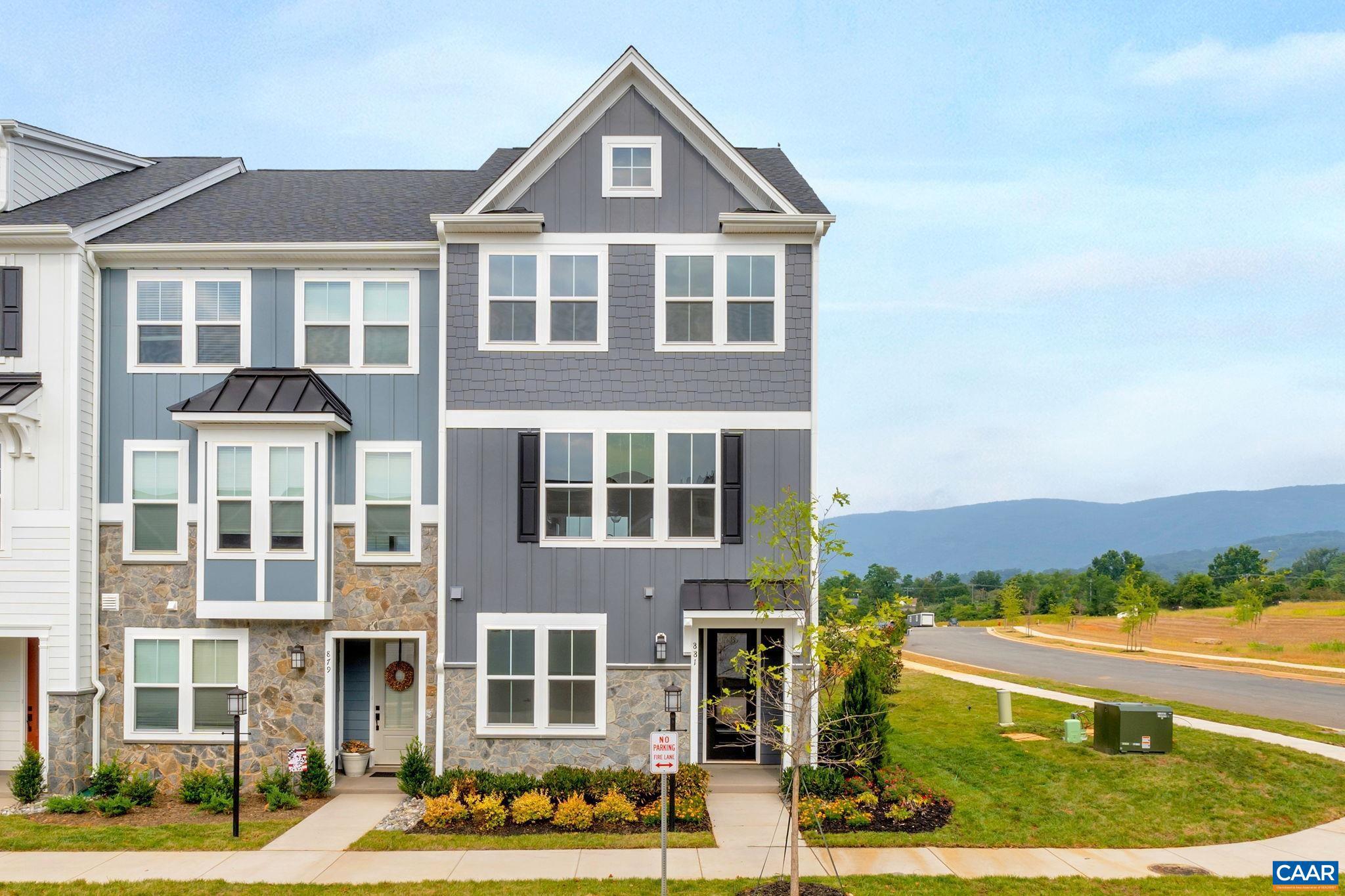 Discover the Holly II, a beautifully designed three-story townhome in the newest section of Belvedere. Fall '25 completion! This stunning home offers a spacious and flexible layout, starting with a rec room and half bathroom on the first floor, perfect for a gym, office, playroom or den. The second floor?s open-concept design features a large kitchen with a walk-in pantry, a generous dining area, and a sunlit family room, ideal for entertaining or everyday living, plus an additional half bath. Upstairs, the primary suite provides a retreat with a luxurious en suite bath, while two additional bedrooms share a well-appointed hall bath. The laundry is conveniently located on the third floor, making household tasks a breeze. Thoughtful upgrades like oak stairs with open railings and gas appliances add both style and functionality. A rear two-car garage offers parking and extra storage. Belvedere offers an array of amenities, including access to parks, close proximity to the Rivanna trailhead, the nearby SOCA Fieldhouse, a dedicated dog park for pet owners, and enchanting playground areas. Photos are of similar home and may show optional upgrades.,Granite Counter,Maple Cabinets,Painted Cabinets,White Cabinets,Wood Cabinets