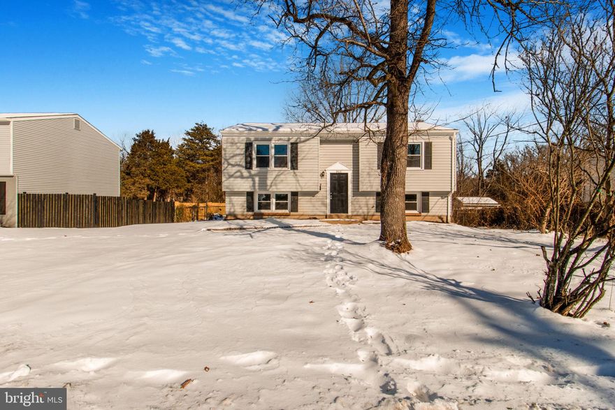 Recent Trane HVAC, water heater, washer/dryer, appliances, windows, flooring, kitchen, paint, lighting and plumbing fixtures. Large fenced-in back yard. Off street parking.  2 bedrooms, 1 bath upstairs. 3 bedrooms, 1 bath downstairs. Buyer to verify all measurements. Owner is licensed realtor.