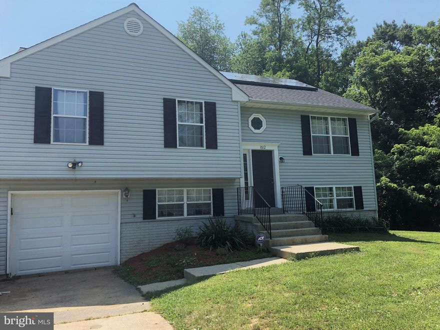 Beautiful, well maintained home boasts hardwood floors in living and dining rooms, hallway and steps. Master suite has large sitting room leading to awesome deck. New roof with solar panels. Recently replaced a/c unit and water heater. Home sits on 1.6 acres of flat land. Short distance to National Harbor and 495.  Call helpful listing agent for showings and questions.