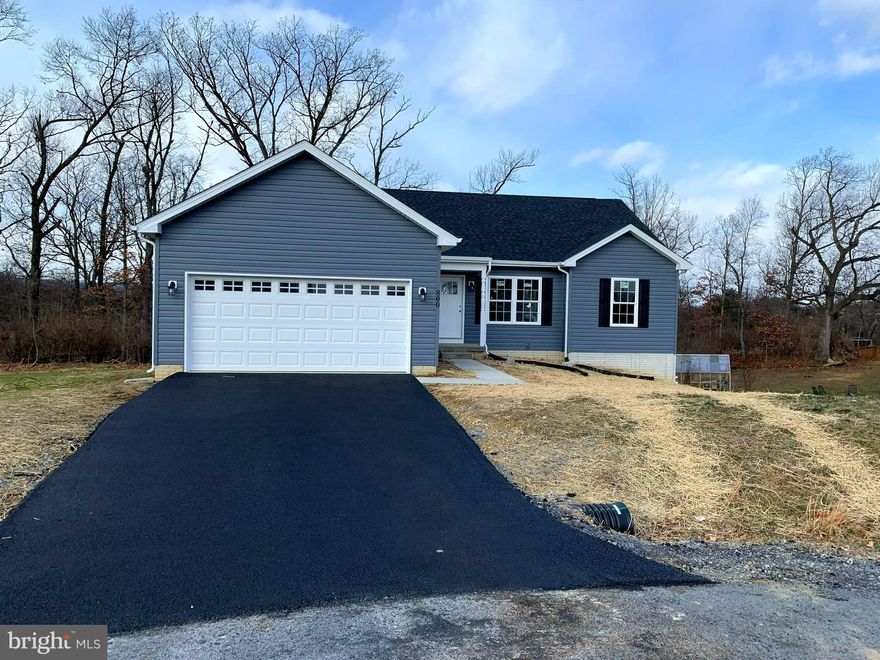 COMPLETE AND READY FOR OCCUPANCY, PRICE REDUCED $10,000.00 TO $334,900.00 AND SELLER WILL PAY UP TO $5,000.00 OF BUYERS CLOSING COSTS (WHEN USING PREFERRED LENDER)  !!!    [PLEASE NOTE THAT MANY OF THE PHOTOS ARE OF SIMILAR CONSTRUCTION].  THIS SPACIOUS RANCH DESIGN OFFERS 1620 sq. ft. OF FINISHED LIVING AREA AND FEATURES A SPLIT BEDROOM DESIGN WITH A GREAT ROOM FEATURING CATHEDRAL CEILING SEPARATING THE MASTER SUITE FROM BEDROOMS #2 & 3. THE EAT IN KITCHEN HAS UPGRADED CABINETRY WITH SOFT CLOSE DOORS AND DRAWERS, GRANITE COUNTERS, A LARGE THREE SIDED PENISULA WITH OVERHANG THAT WILL COMFORTABLY SEAT 6-8, STAINLESS STEEL APPLIANCES AND GARBAGE DISPOSAL. THE SPACIOUS MASTER SUITE FEATURES HIS AND HERS WALK IN CLOSETS, CEILING FAN AS WELL AS A MASTER BATH WITH AN OVERSIZED SHOWER, DOUBLE SINK VANITY AND LINEN CLOSET. ALL ON A FULL (1,620 sq.ft.) WALK OUT BASEMENT WITH ROUGH PLUMBING FOR FUTURE BATH. THE FINISHED TWO CAR GARAGE HAS AN INSULATED GARAGE DOOR AND AUTOMATIC GARAGE DOOR OPENER. CALL TODAY TO ARRANGE TO VIEW THIS HOME. THE FLOOR PLANS SHOWN ARE INFORMATIONAL PURPOSES ONLY. THE ACTUAL CONSTRUCTION OF THE HOME MAY HAVE VARIATIONS FROM THE ORIGINAL PLAN.