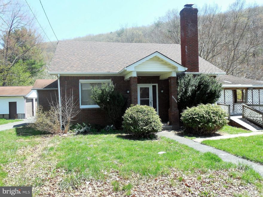 This home sits in a very desirable section of LaVale. The property has 1.25 acres on a corner lot. With some TLC and your personal touches this home will be a dream. There is an outdoor stone fireplace and a detached 2 car garage and circular drive. Two main level bedrooms and another 2 on the upper floor. Come put your imagination to work and make this house your HOME!!