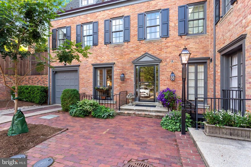 Ideally situated in a private enclave in Georgetown's sought after East Village, this unusually large and beautifully renovated townhouse boasts nearly 5,000 sq/ft of light-filled living space and tranquil outdoor living and Garage parking. Main Level is perfect for entertaining featuring an elegant open floorplan which includes an updated eat-in Kitchen with stainless steel Viking appliances, ice maker, and wine refrigerator, Dining Room, Powder Room, and expansive Living Room with custom built-ins and beautiful fireplace. Enjoys direct access to gorgeous rear private Patio with mature plantings. Upper Level 1 features gracious Owner Suite with Bedroom overlooking Patio, Full Bath with soaking tub, large walk-in Closet, Office, and Bedroom #2/Library. Upper Level 2 features 2 large Bedrooms and Living Area. Lower Level with spacious Rec Room, Kitchen/Laundry, and Bedroom #5 with separate entrance that can function as au-pair/in-law suite. All Bedrooms have their own en-suite Full Baths. 1 Car Garage.