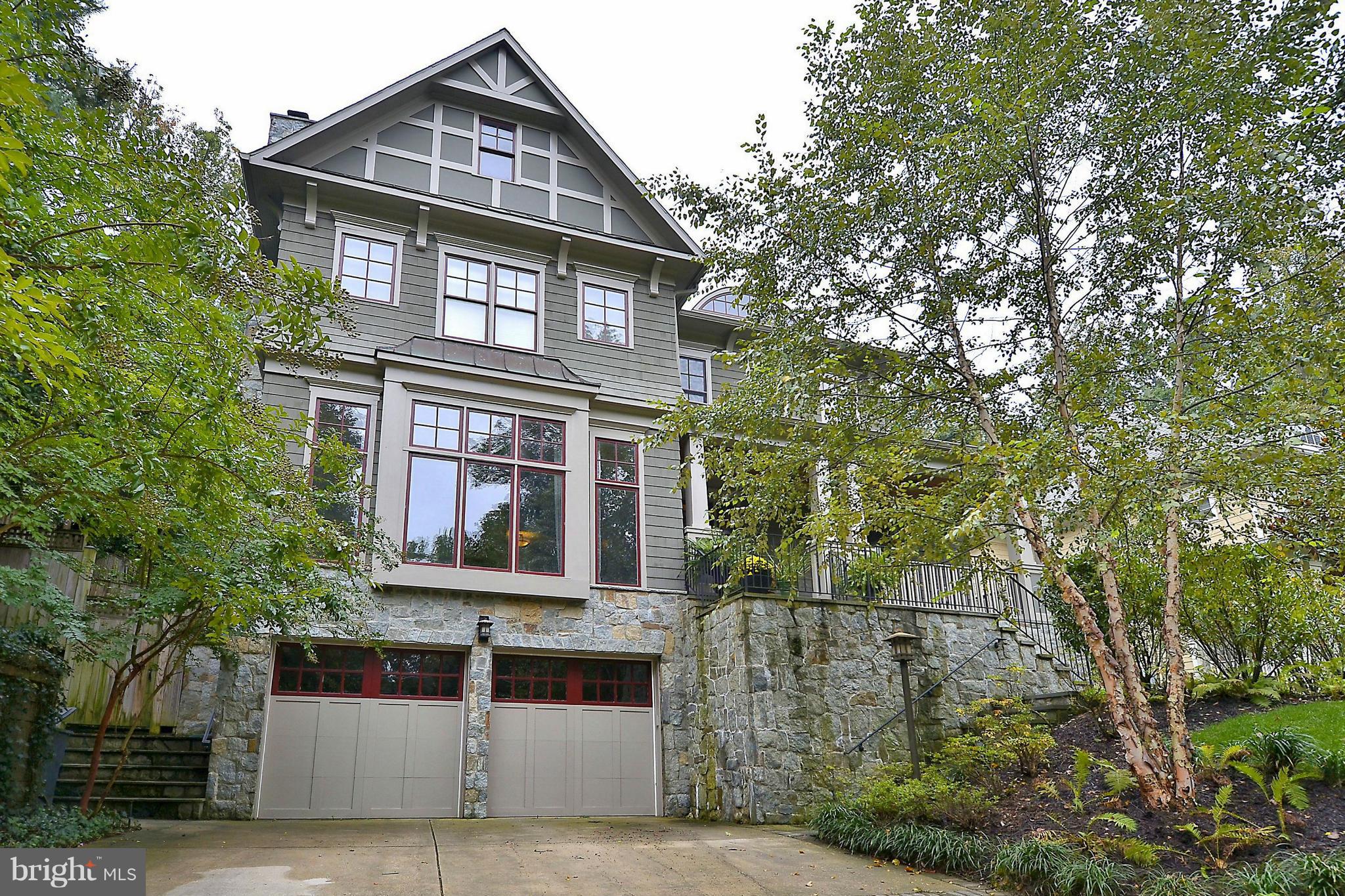 Magnificent Arts & Crafts gem built by Chase in 2004--better than new! Dramatic entry with library & step-down Great Room. Formal dining & gourmet kitchen with large casual eating area & adjacent sunroom. Brazilian Cherry floors, built-in shelving, surround sound, in-ground sprinklers, flagstone patio & fire pit. A very special home! Don't miss the Virtual Tour.