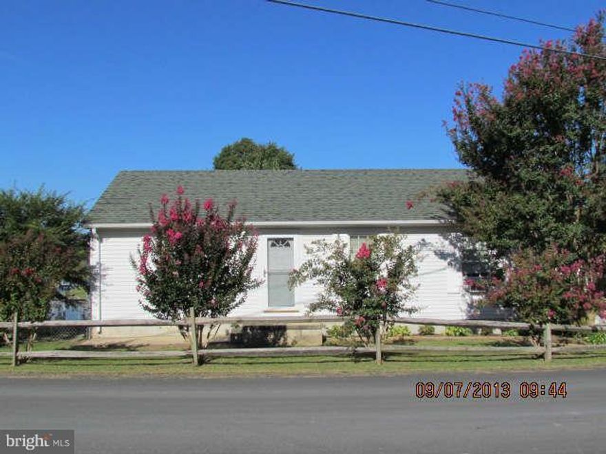 Looking for the perfect little "Get Away" home. This 2 bedroom 1 bath waterfront rambler features a living room and an eat-in kitchen. Enjoy relaxing on the deck while watching the sunset or while fishing or crabbing from the pier. Pier features water and electric and access to Breton Bay/ Water Frontage Sq Ft is approximate.