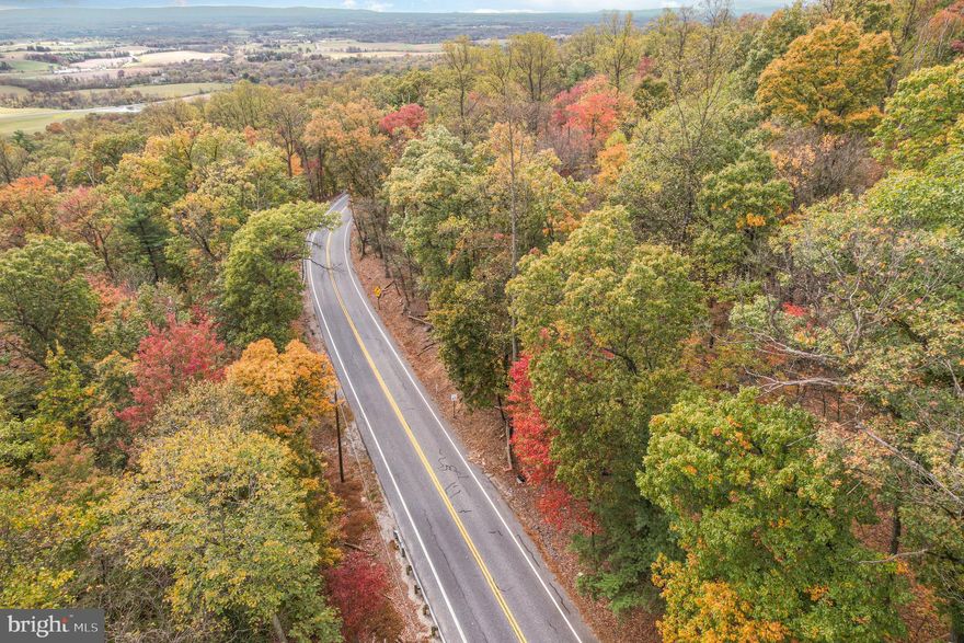 Just minutes from Carlisle - a total of 8.31 beautifully wooded mountain acres, approximately 6 acres of which is located on one side of Waggoners Gap Rd, the otherapproximate 2 directly across the road. Build your dream home, create a serene getaway - make it your own! Within close proximity to Kings Gap, Opossum Lake, Colonel Denning State Park - many outdoor activities - all the while still within easy commuting distance and access to local amenities. Rural living, close to town -  the best of both worlds!
