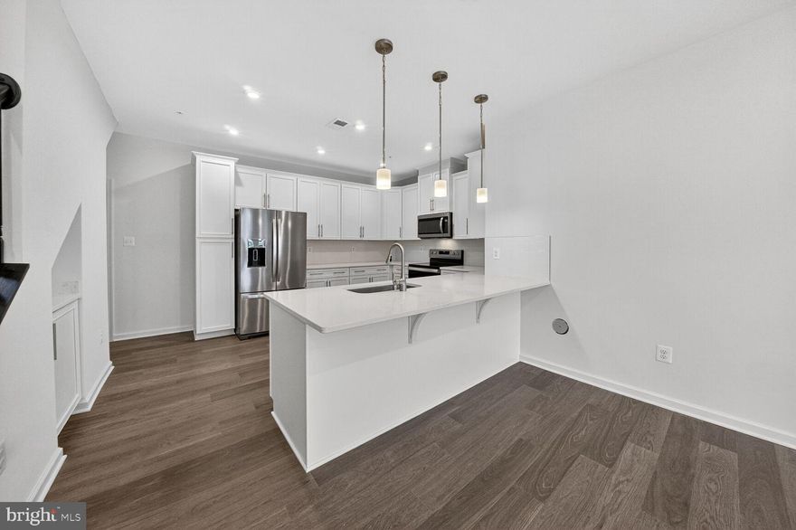 End Unit!! Discover Upscale Living at Paddock Pointe. Nestled in the heart of Howard County, Paddock Pointe offers a sophisticated, metropolitan-inspired lifestyle with unbeatable convenience. Enjoy easy access to commuter routes, scenic walking trails, a community dog park, and more! Experience modern living in these luxurious two-story condos with attached garages—schedule your tour today! Enjoy this lower level, 1-car garage condo in Laurel's Paddock Pointe community! The Riva features a spacious kitchen with plenty of cabinets and counter space, as well as, Whirlpool stainless steel appliances. The kitchen connects to the great room which offers plenty of natural light and grants access to the second floor. Upstairs enjoy a conveniently located laundry room and your choice between 3 bedrooms or 2 bedrooms and a loft. The primary suite features a spa-inspired bath and a large walk-in closet that is bound to impress! *This listing reflects the base pricing for the Riva model on a to-be-built lot in the community. *Photos are of the decorated model home. *Pricing, features and, availability subject to change without notice. MHBR No. 93. 2021 Beazer Homes.