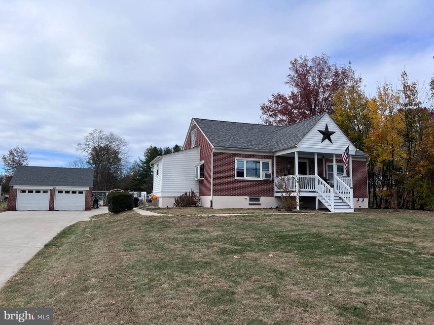 NEW PHOTOS COMING SOON! Welcome to this well-maintained brick Cape Cod perfectly situated on over an acre of land! This charming 4 bedroom, 2 bathroom home offers a flexible layout with two bedrooms conveniently located on the main floor and two additional bedrooms on the upper level. The updated eat-in kitchen is both functional and inviting, featuring modern finishes and direct access to a mudroom that leads into the fenced in backyard. Off the kitchen is the spacious living area and beautiful hardwood floors flow throughout the home, and the huge unfinished basement provides endless possibilities for additional living space, a home gym, or storage. Outside, you’ll find a spacious yard, a detached 2-car garage, and plenty of room to enjoy outdoor activities or future expansion. Located in a fantastic area with easy access to Route 100 and Route 422, this home combines classic charm, modern updates, and convenience.