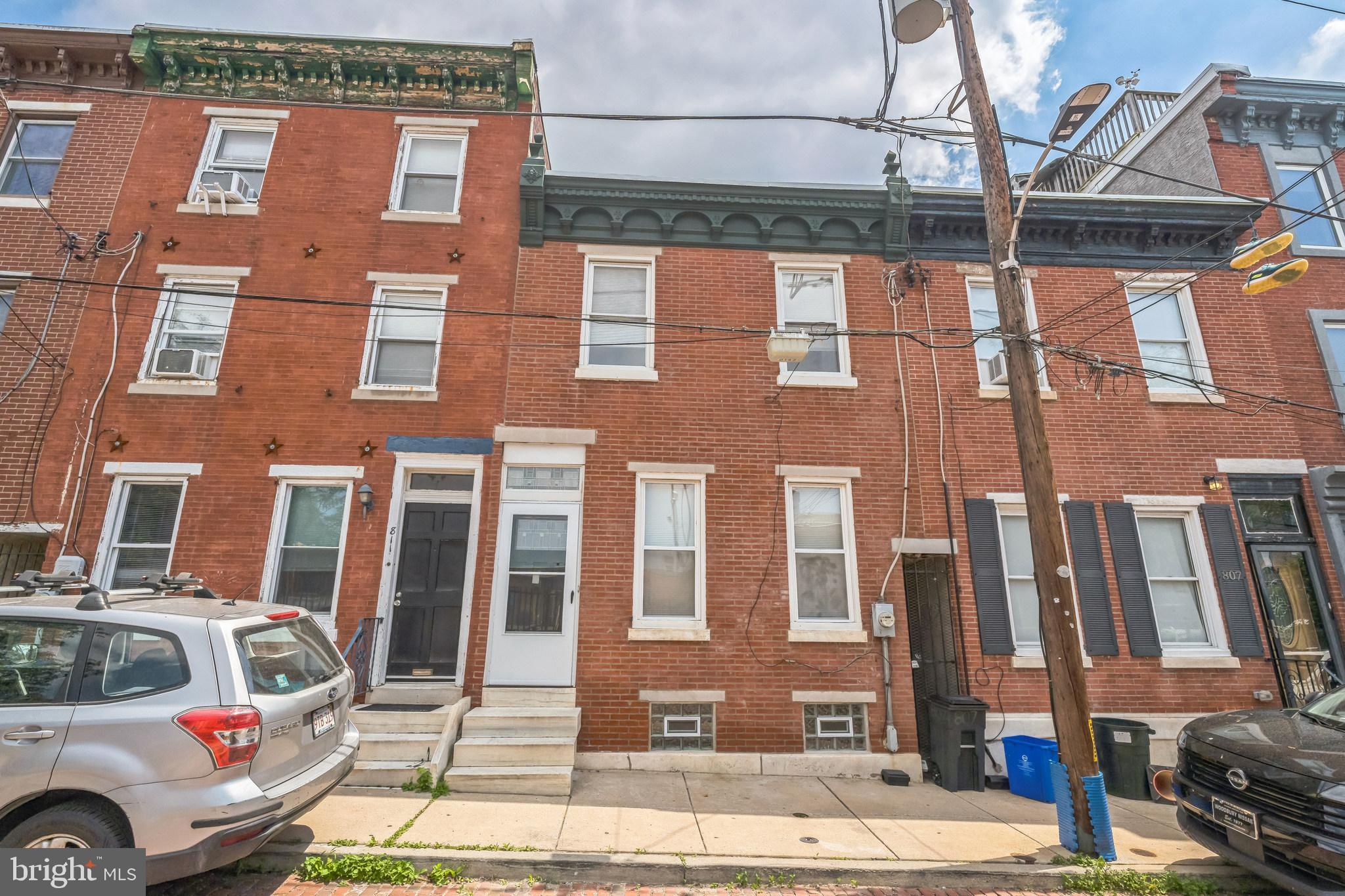 The two story townhouse, in move in condition, is located in the historic Francisville/Fairmount area of Philadelphia. Enter into a vestibule and then into an open Living Room with ornamental marble fireplace and ceiling fan. Dining room with chandelier and both Living Room and Dining Room have solid oak floors and crown molding. The Living room/Dining room is visually open to the Kitchen with a breakfast bar, stainless steel appliances, quartz countertops, ceiling fan and subway tile back splash. Through the kitchen is another room that has a pantry closet, laundry facilities and a separate Powder Room. This room leads to the back patio with privacy fencing. The 2nd Floor has three Bedrooms, with laminate floors and ceiling fans. There is a hall tiled Bath, cedar coat closet and, a full linen closet. Also on the 2nd floor, is a larger cedar closet with shelving.. Full basement with plenty of storage. High Efficiency HVAC system replaced in 2021- forced air with central air. The house faces a park, community center and pool. Walking distance to the historic Eastern State Penitentiary, the Art Museum and Fairmount Ave. restaurants, shops and accessible public transportation.