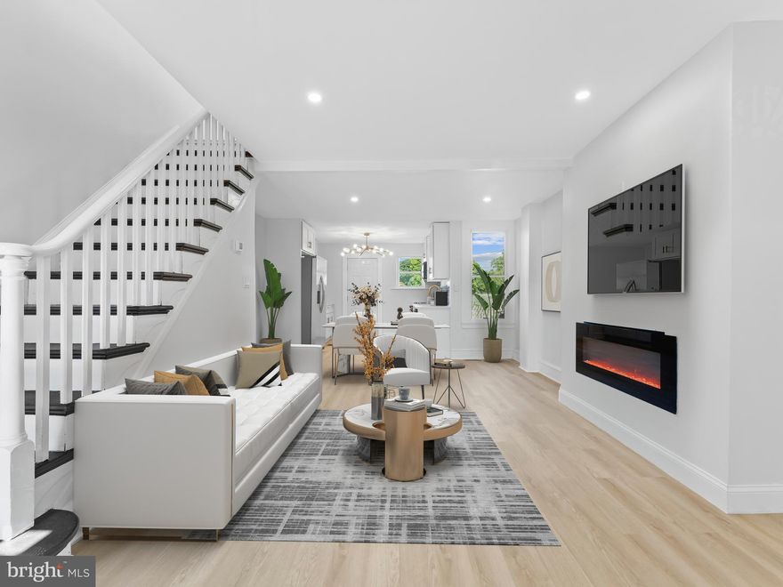 *** New Price*** Seller is Motivated...Introducing 6931 Rodney Street, a modern oasis in West Oak Lane! Discover this beautifully renovated townhome nestled in the heart of West Oak Lane, Philadelphia. With its stylish design and thoughtful updates, this cozy abode offers a comfortable and inviting living space. Step inside to be greeted by beautiful laminate flooring that flows seamlessly throughout the home. Recessed lighting and a captivating electric fireplace create a warm and inviting ambiance. The brand-new galley-style kitchen is a chef's dream, featuring soft-close white shaker cabinets, a glass subway tiled backsplash, and stunning quartz countertops. Stainless steel appliances complete this modern culinary space. Two full modern bathrooms provide convenience and comfort, while the finished basement offers a versatile space for entertaining or relaxation , the basement also adds 350 sqft of living space! Enjoy outdoor living on the charming front patio or the spacious rear deck. As an added bonus, there's an additional outdoor area perfect for gardening or hosting gatherings. This townhome is a true gem, offering a blend of style, comfort, and functionality. Don't miss the opportunity to make it your home!,