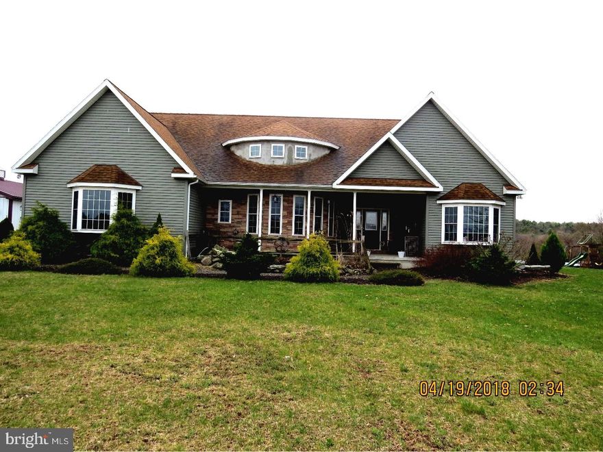 Welcome home!! Charming custom built ranch home on over 4 acres with open floor plan, attached 2 car garage and additional 30 x 32 pole building! This home offers bamboo hard wood flooring, ceramic tile, wrap around deck, covered patio for backyard entertainment, above ground pool with deck, master suite with walk in closet, plenty of cabinet space, and dining area. Garage has radiant heated flooring. Home has gas heat and cooling with 5 separate zones. Walk out basement was partially finished and with the high ceilings it allows for easy finish. Built 8 years ago with lifetime windows and all appliances remain!! Pine Grove Area School District.