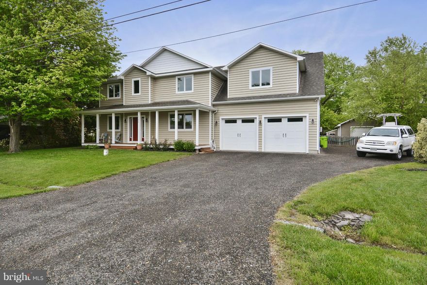 Home has something for everyone ! See "interactive floorplan" in virtual tour. Custom kitchen with granite -  stainless steel appliances. Master bath w/ custom shower & tile work. Oversized 24 X 32 garage and a detached workshop . New BAT septic in 2014.  Great lot & location - Community is one of a kind - several beaches, playgrounds, boat ramp & amazing views.  Live like you're on vacation !