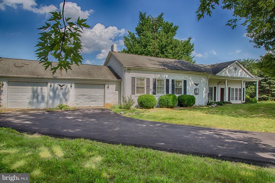 Spacious 4 Bedroom home, with 2 full baths on 2 unrestricted acres.  Original structure was the Mt. Airy School built in 1886 and a major renovation occured in 1950 with the home addition. Two garages and a driveway curving around this home on a corner lot with mature trees and lush landscaping. A shed and run-in shed are included.  The home has been upgraded with solar panels. Must see!