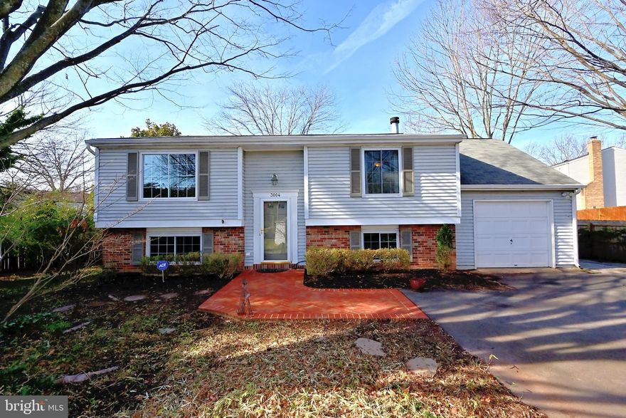 Light filled Cozy two level Rancher!  split foyer with upgrades, tucked into private setting, brand new paint , carpet  engineered hardwood floor on main, stainless appliances, vinyl energy efficient windows, walk out sliding door on main to huge deck with walk down to private rear yard. Kitchen with Stainless steel appliances   lower level has bedroom and full bath, rec-room w/ custom stone veneer fireplace, engineered flooring  walk out level, rear door. One car attached garage. Incredible public school pyramid! move