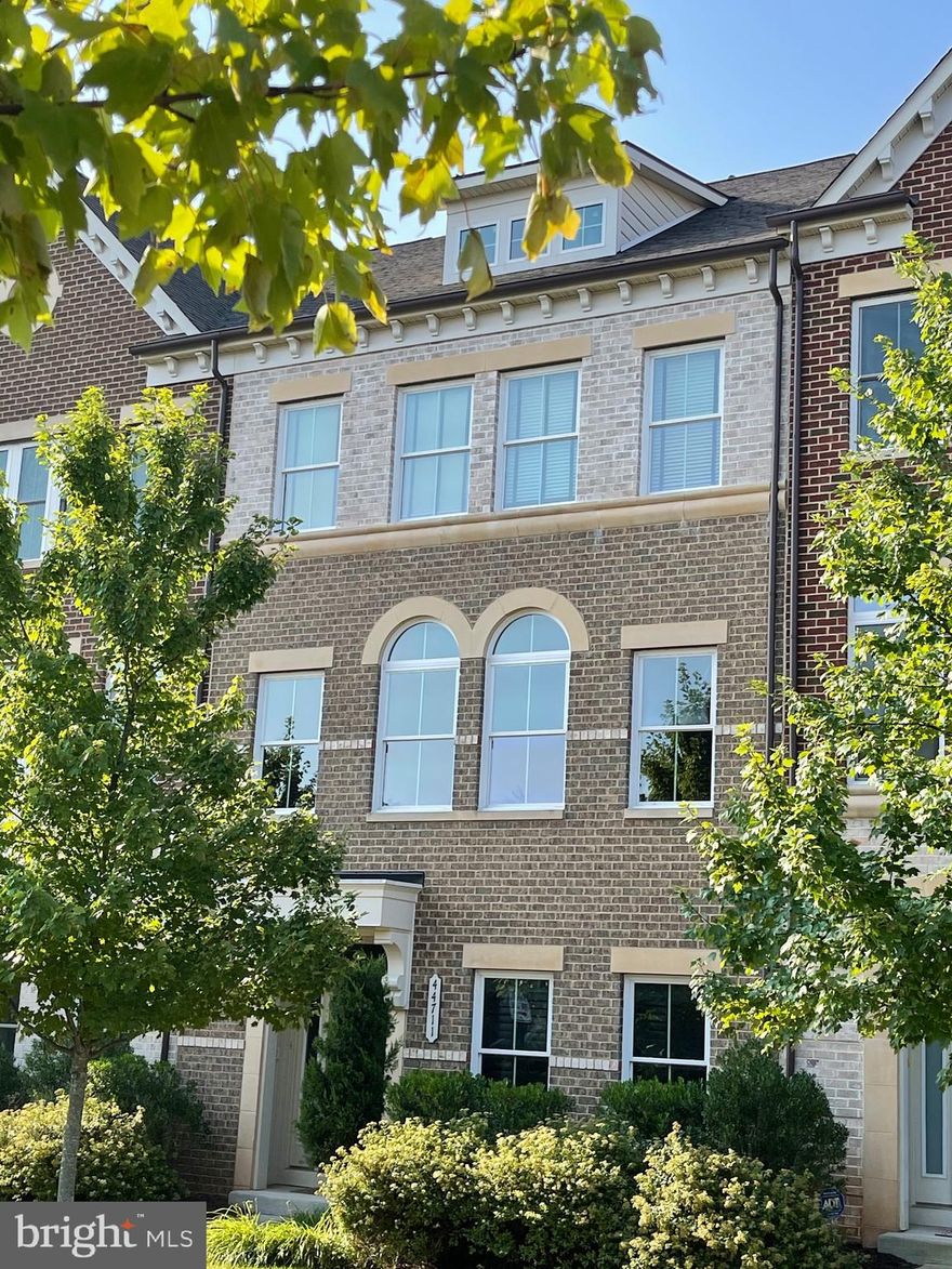 *** 3,370 SF (4BR+4.1Bath + 2 Car Garage) *** BRIGHT & OPEN FLOOR PLAN ****** LONG & WIDE DRIVEWAY(CAN PARK 4 CARS) *** PLENTY GUEST PARKING SPACES CLOSE BY *****Welcome home to this beautiful NV, Energy-Star Certified, townhome in sought after One Loudoun. Move right into this breathtaking, beautiful townhouse and start enjoying all that Ashburn & One Loudoun has to offer! Enter this home from the sunny ground floor foyer to the recreation room with a fabulous built-in wet bar & beverage regrigerator. This flex space can be used as a rec room, game room, office space, or even guest quarters since it has its full bath. The main level is completely open and features Chef’s dream kitchen with every bell and whistle imaginable. This gourmet kitchen has a huge island big enough to seat an entire family, stainless steel appliances, gas cook-top, a spacious pantry, is open to the living room and dining room so you can cook and not miss out on everything else that is going on around you. AND, it even has a rarely available gas fireplace with tile surround. French doors lead you to your maintenance-free deck, conveniently located for easy access to grilling or chilling. On the next level you will find the light-filled master suite with tray ceilings, dual walk-in closets and a luxury bath, as well as two additional nice sized bedrooms with their own bath. The fourth floor is currently being used as a home office and guest suite but has endless possibilities -- a 4th full bath and the entrance to the Roof-Top terrace are just a bonus! One Loudoun’s amenities are top-notch and include lawn/yard maintenance, Clubhouse with resort style pool, dog park, additional community recreation areas and monthly entertainment events. A stone’s throw from One Loudoun shopping center with plenty of restaurants, retail, entertainment and year-round Saturday morning Farmer’s Market. This is truly an amazing home in a fantastic location! ***(OWNER IS LOOKNG FOR GOOD CREDIT, GOOD INCOME, GOOD RENTAL HISTORY APPLICANT) *** Min. 2 years lease Term ***