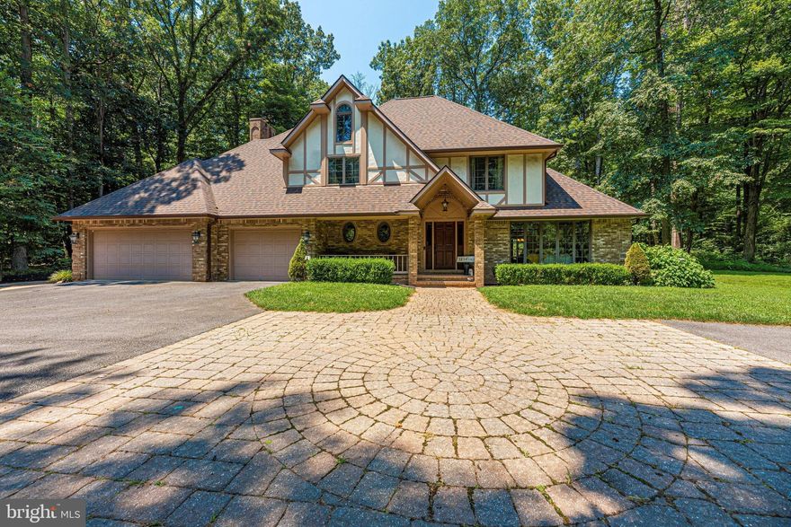Absolutely GORGEOUS estate home situated on 5 acres.  Backyard is a paradise with a beautiful in ground pool and extensive hardscaping perfect for entertaining.  You'll enjoy plenty of privacy on this lot with mature trees.  The spacious interior includes updated kitchen with granite, stainless steel appliances, and plenty of cabinet space, huge family room with built ins and fireplace, separate formal dining room, and large living room.  Primary bedroom with newly renovated bathroom. Three additional ample sized bedrooms.  New HVAC.  You'll fall in love with this house from the moment you drive up!