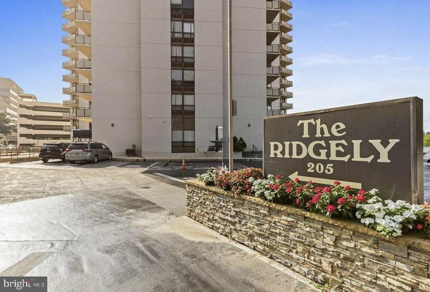 PHOTOS COMING SOON!  
Location, location, location, right?  How about living 2-3 blocks from all the action that downtown Towson has to offer...the dining, night life, shops, services and activities...without the madness of navigating from the middle of it and with your own 2 car garage parking?  This newly refreshed 11th floor unit - the largest 2 bedroom layout available - offers expansive southeasterly views of the Towson skyline (you should see it sparkle at night!) and a layout that is spacious and airy with generously proportioned living spaces throughout. Featuring an impressively sized kitchen with a huge pantry, large living and dining rooms with walls of windows giving abundant natural light and panoramic cityscape views, in-unit laundry (ahh!) and two large bedrooms (primary bedroom includes ensuite bath and walk-in closet). The building has 3 elevators, a friendly 24-hour front desk service with 24/7 security monitoring, a fabulous inground saltwater pool to indulge in on those summer scorchers and a large fitness room.