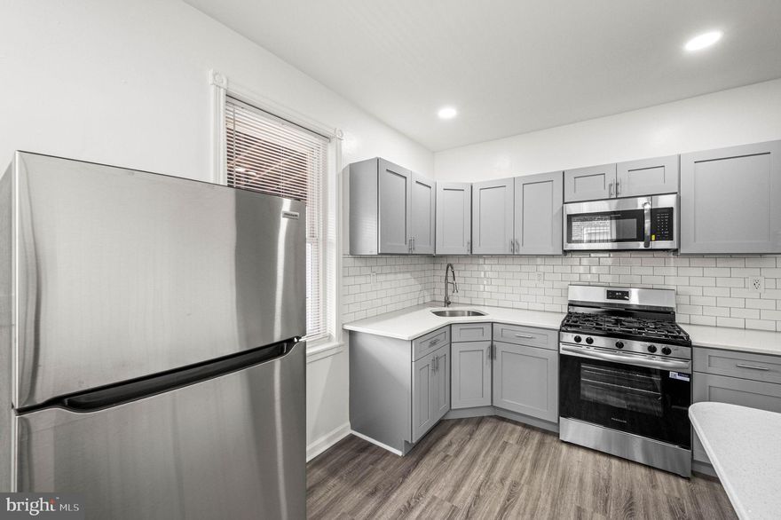 Welcome to this beautifully fully renovated home in the heart of Tacony! This spacious twin offers modern upgrades and an open-concept layout perfect for today’s lifestyle. Featuring 3 large bedrooms and 1.5 brand-new bathrooms, the home boasts tall ceilings and a bright, airy feel throughout.

Step inside to find a stunning, large brand-new kitchen with plenty of counter space, new cabinets, sleek quartz countertops, stainless steel appliances, and a stylish subway tile backsplash—perfect for both everyday living and entertaining. Recessed lighting adds a clean, modern touch, while the new heater and air condenser ensure year-round comfort.

Enjoy outdoor living with a welcoming front porch, a front yard, and a private backyard that includes a deck—ideal for relaxing or hosting gatherings. A full basement provides additional storage space and flexibility.

The home also features a partially finished attic, perfect for additional storage.

This move-in-ready home has everything you need and more. Don’t miss your opportunity to own a beautifully updated property in a convenient location!