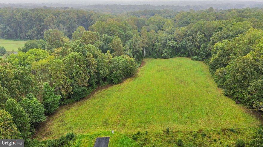 This stunning 5.01 acre parcel offers the perfect blend of natural beauty and convenience, with nearly 3 acres of open, cleared land ready for your dream home. The property includes an approved 5-bedroom conventional septic certification letter, perfect for building a spacious residence. A paved easement provides easy and direct access, ensuring both privacy and convenience. Nestled in a peaceful, picturesque setting, yet just a short jaunt to both Ox Rd and the Fairfax County Parkway, this exceptional piece of land offers endless potential for creating your ideal residential retreat.