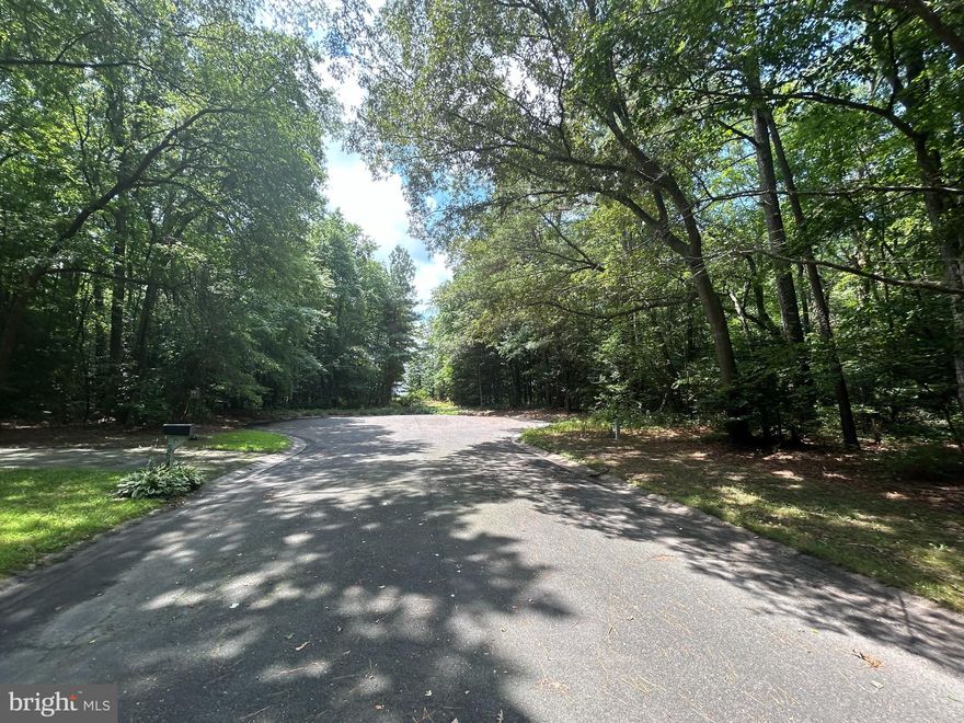 Beautiful setting and location to build your dream home.  This large 6.3 acre wooded lot is at the end of a cul-de-sac.   Great location, close to Berlin and Salisbury.