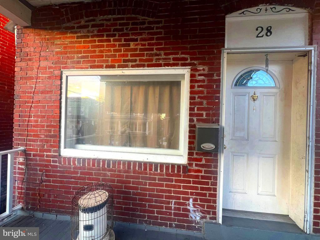Photo of 28 Boone Street, CUMBERLAND, MD 21502 (MLS # MDAL2013626)