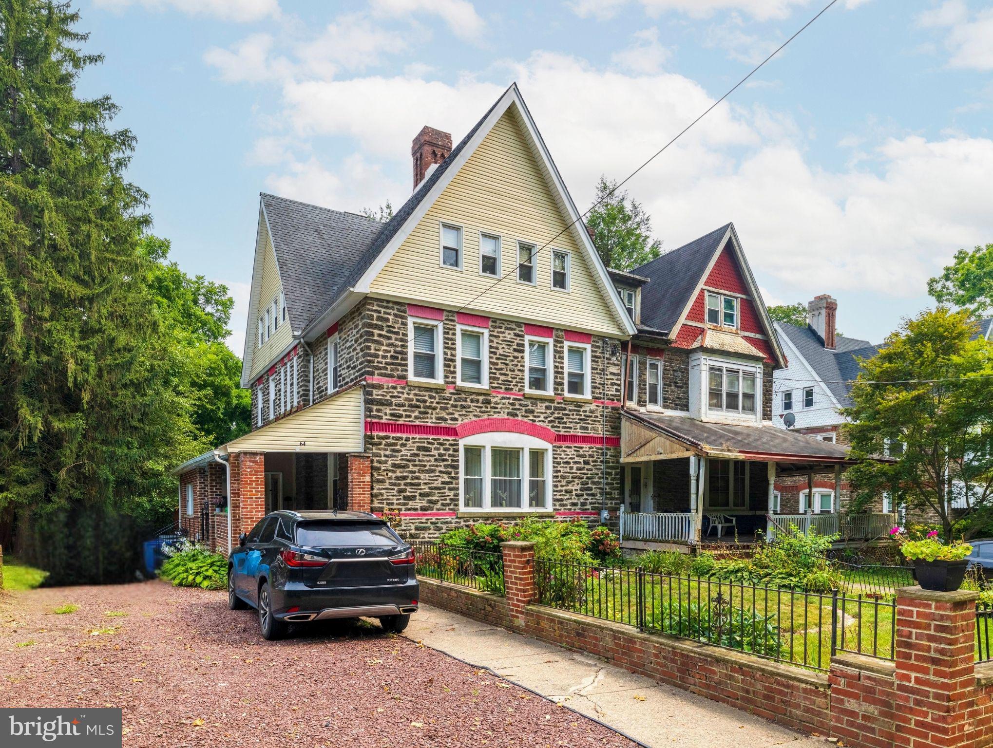A Rare Find in Germantown—Spacious, Stylish, and Full of Character!
Welcome to 64 E Johnson Street—an extraordinary 8-bedroom, 5.5-bath twin home offering over 5,000 square feet of thoughtfully designed living space. Fully renovated in 2013, this one-of-a-kind property seamlessly blends modern comfort with timeless charm. If you’re looking for something far from cookie cutter, this is it.
Step through the tiled foyer/sunroom into a first floor that offers the ideal layout for both daily living and entertaining. A large eat-in chef’s kitchen sits at the heart of the home, complete with ample counter space and room to gather. The adjacent dining room and great room offer open-concept comfort and style, with seamless transitions between each space. A versatile first-floor bedroom and full bath provide the perfect option for guests, a home office, or convenient single-level living.
Upstairs, the second floor boasts three spacious bedrooms, including a private main suite with an en-suite bath and a cozy fireplace in the large living room. A hall bath completes this level. The third floor offers four additional bedrooms and two full bathrooms, providing flexible space for every need.
The fully finished basement features multiple rooms, a laundry area, and a convenient half bath—perfect for added living space. It opens directly to the expansive fenced-in backyard and deck. A private driveway provides off-street parking for up to five vehicles.
With central air, a flexible layout, and an abundance of living space, this home is ideal for those who value room to grow, work, and live comfortably—all nestled in a vibrant, historic neighborhood. Close to Germantown Avenue, Washington Lane and Lincoln Drive, you'll enjoy easy access to shops, dining, parks, public transportation, and a quick commute to downtown.