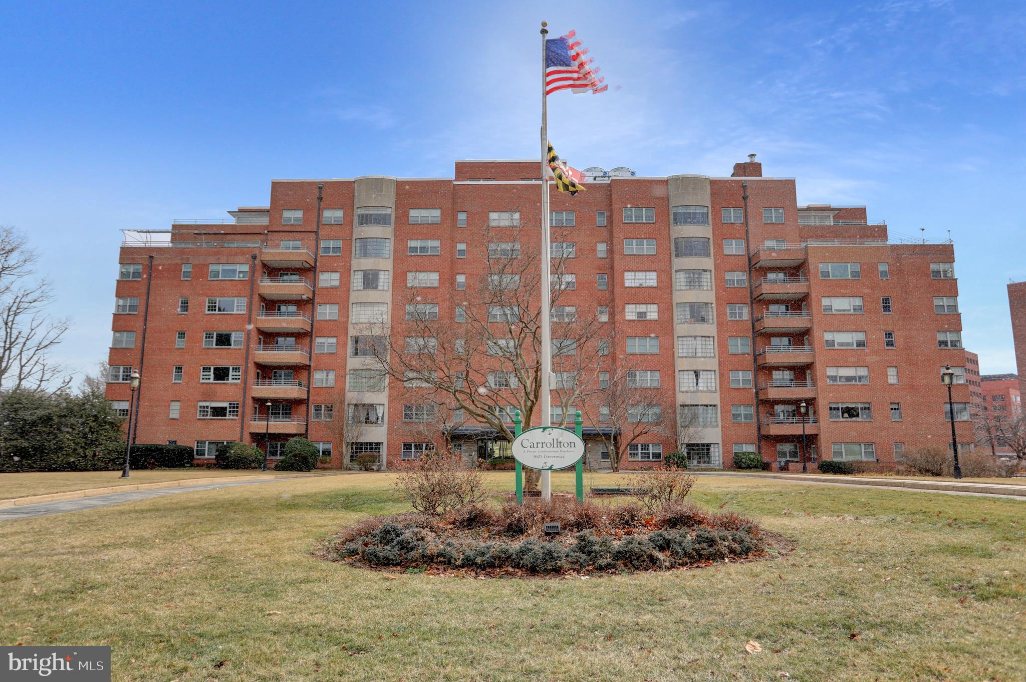Welcome home to this bright and inviting 2-bedroom, 2-bath condo in the sought after Carrollton. Hardwood floors flow through the expansive living and dining areas, complemented by oversized windows that frame scenic treetop views. The updated kitchen features sleek granite countertops, stainless steel appliances, and crisp white cabinetry—perfect for cooking and entertaining. Just off the kitchen, a unique dining nook with a chalkboard accent wall adds charm and personality to the space. Each of the two full bathrooms showcases timeless black-and-white tile with pedestal sinks and modern fixtures. The large primary bedroom includes ample closet space and soft carpeting for added comfort, while the second bedroom is ideal for guests or a home office. Deeded parking space conveys! With its smart layout, classic design elements, and serene setting, this home is ready for your personal touch. Conveniently located near shops, dining, and commuter routes—don’t miss the opportunity to make it yours!