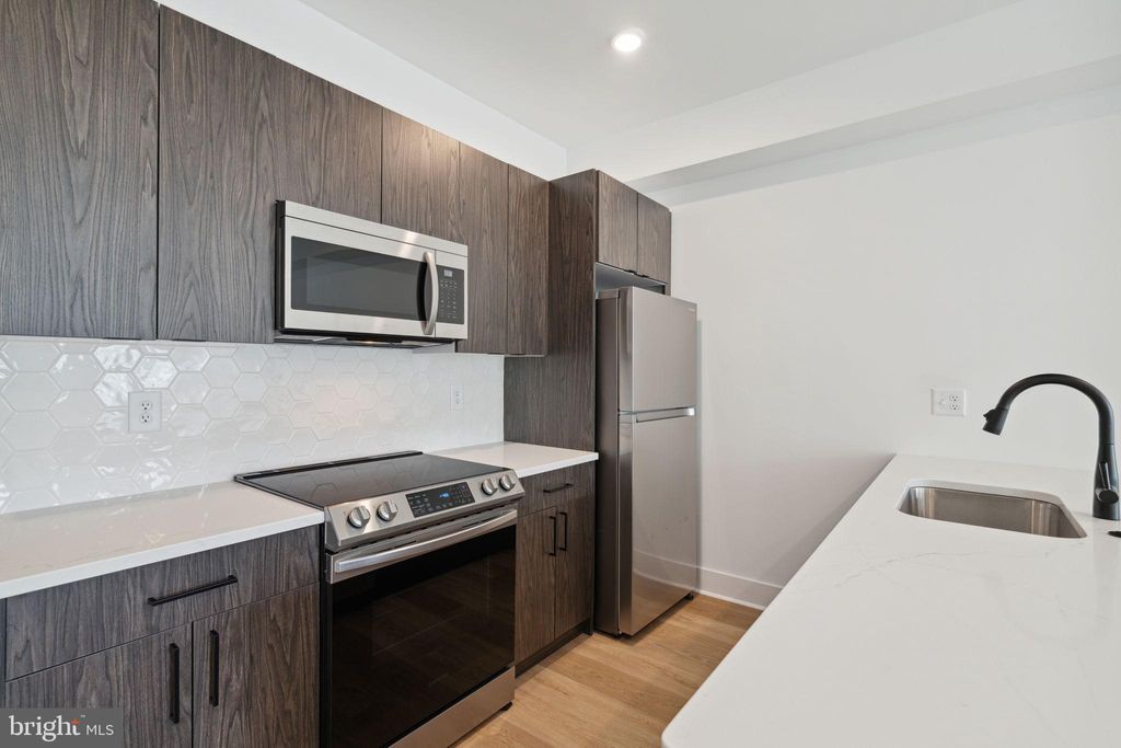 Photo of 1419 W Grange Avenue #204, PHILADELPHIA, PA 19141 (MLS # PAPH2556594)