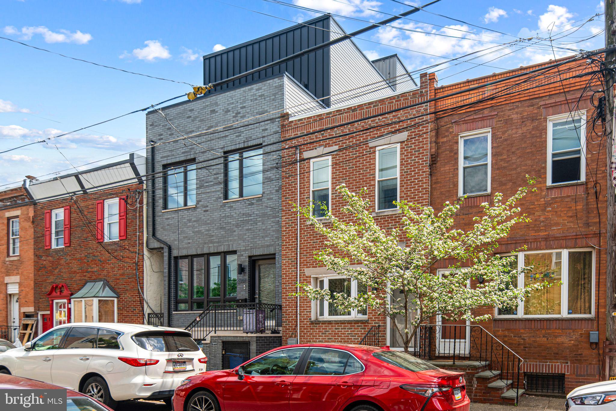 Meticulously maintained and upgraded home in desirable Port Richmond! Very large property 14 x 112 with a 14x14 two story addition built in the backyard, together totaling 2300 square feet of living space. Kitchen was recently upgraded (2024) with new flooring and light fixtures.
First floor features open concept Living Room that leads to your beautiful and functional updated Eat-in Kitchen with 42" cabinets, granite counters, breakfast bar with updated appliances. Also on this floor is 1/2 Bath and convenient main floor Laundry! The Pièce De Rèsistance is an additional family room in the rear that can become whatever you can think up. Keep going out to your fenced in private yard where you can enjoy summer nights or let the dogs run. Your large addition out back was used as a private gym but can be your home office, studio, or whatever your heart desires!
Head upstairs to your large Primary Bedroom with a huge, custom walk-in closet. Bathroom was recently fully updated (2025) with stand-up all tile shower with seat and glass shower door, touch mirror for anti-fog and color, a stunning stand-alone soaker tub, and bone laid tile flooring. Third bedroom in the back has also been updated and expanded. This house has everything you could need and want.
Within walking distance to vibrant restaurants like Philly's famous Tacconelli's Pizza & Stocks Bakery, and easy access to public transportation & I95. Make your appointment today and live where you love!