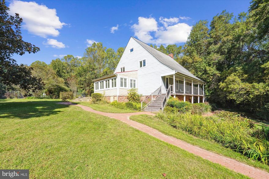 **ASSUMABLE MORTGAGE AT 2.75%** DO NOT WAIT! Discover an extraordinary opportunity just 20 minutes from Washington DC! This spacious property offers a unique blend of a weekend retreat, investment potential, and serene living nestled among the trees. The main residence, boasting 5,010 square feet across 4 levels, is complemented by an inviting inground salt-water pool and a separate pool house, all set on an expansive 50-acre estate.

Prepare to be captivated as you step into this remarkable home. The open-concept layout welcomes you with gleaming hardwood floors that flow seamlessly throughout. Cozy up by the wood-burning fireplace in the living area which leads way to the completely renovated kitchen. Kitchen boasts brand new LG stainless steel appliances, solid ash wood slow-close cabinets, quartz countertops, and a large farmhouse sink. This kitchen is absolutely breathtaking and the centerpiece of the home. Entertaining is a breeze in the spacious, private dining room, and the main level offers practicality with a half bathroom in addition to an owner's suite featuring a private, fully renovated bathroom and an expansive walk-in closet.Venture downstairs to the finished walk-out basement, where you'll find a rough-in for a second kitchen, expanding your culinary possibilities or creating the perfect space for gatherings and relaxation, a half bath, and a seperate recreation room.Upstairs, discover four additional bedrooms and two full bathrooms, ensuring comfort and space for family and guests.

A second residence on the property presents an ideal investment opportunity, generating potential rental income. With its independent value of at least $250,000, this second home can be leased on a month-to-month basis (currently has a tenant in a 2 year lease until April 2024 for built-in income). This home has two bedrooms, a full bathroom, a sizable kitchen with dining opening to the living room with a wood burning fireplace. This second residence has new flooring throughout, along with a new HVAC system. A large cleared area adjacent to the guest house provides ample space for storage of business equipment, boats, cars, or recreational vehicles. Enjoy the benefits of low taxes, thanks to its current inclusion in a forest/agricultural conservation plan. This truly unique opportunity combines the best of both worlds – a spacious 5,010-square-foot home with a pool on 50 sprawling acres – all within a 20-minute commute to Washington DC. FREE Appraisal with preferred lender and $500 off closing costs with preferred title company. Schedule your private tour today!