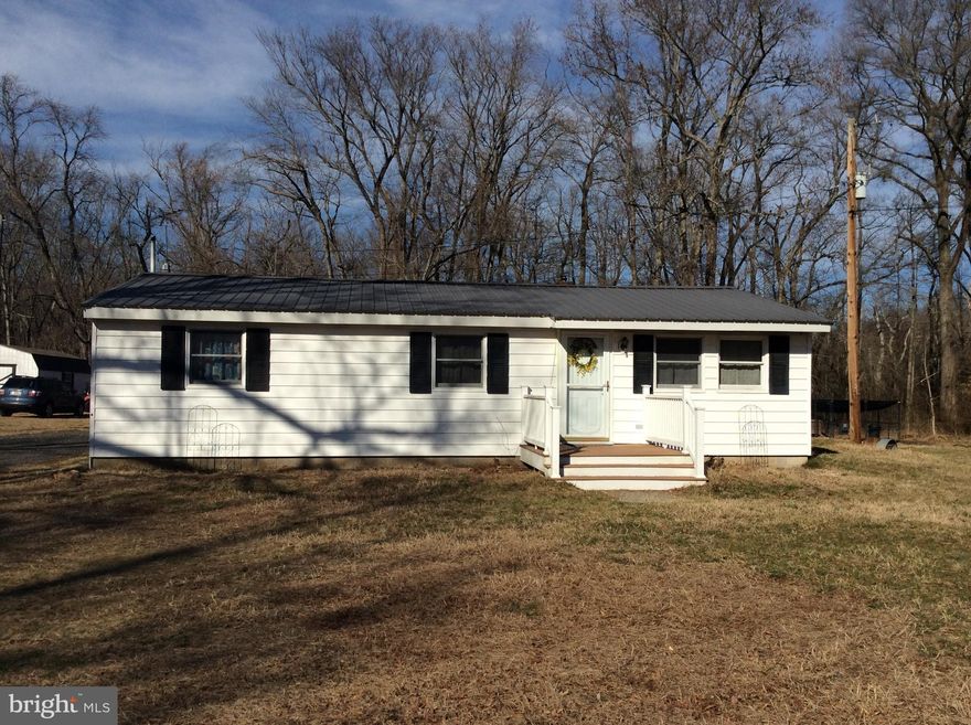 Country rancher convenient to Rt.301, to head North or South.  Home is in very good condition with room for large family.  Yard for the children and stream for the ones that enjoy fishing.  Very cozy warmed by the Gas stove in Family Room.  Take a look you will be surprised.