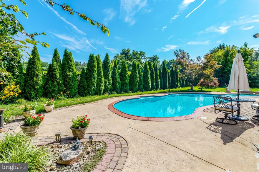 Welcome into 6820 Dunaway Ct, a truly one-of-a-kind home located in one of McLean's most premiere neighborhoods. This spacious spilt-level property has been transformed to evoke the feel of a stunning mid-century modern masterpiece. The property, sitting on 0.35 acres is surrounded by matures trees and a beautiful pool. The expansive large backyard offers a private oasis for family and friends. 

Step through the front door and into a world of light and warmth. The main floor is a blend of tradition and openness, with 14-foot ceilings, crown molding, and gleaming floors create a refined yet welcoming atmosphere. Just beyond, the heart of the home—an exquisite gourmet kitchen—awaits. Outfitted with top-of-the-line Thermador stainless steel appliances, a wine fridge, and a generous island. The kitchen flows seamlessly into a cozy sunroom that overlooks the pool and and backyard that conjure the feel of an English countryside.

The main level features charming dining room and renovated family room with floor-to-ceiling windows and offers direct access to the patio. In addition, there is a mudroom with a full shower (perfect for using after the pool) and laundry room off the 2-car garage. 

Upstairs, the story continues in the beautiful primary suite, where rich, refinished hardwood floors lead the way into a sanctuary made for rest and rejuvenation. Here, not one, but two walk-in closets—each with its own private vanity—offer abundant space and a touch of luxury. Between them, a spa-like shower. Two additional bedrooms on this level share a Jack-and-Jill bathroom.

The lower level of the home is full of surprises, with a fully finished walkout basement. A spacious recreation room with a wood-burning fireplace offers endless possibilities—from game nights to movie marathons—while a wet bar makes entertaining effortless. Two more guest rooms and a connecting bathroom create a welcoming space for visitors or extended family.

Evermay is ideally located, just three traffic lights from Washington DC via Chain Bridge and the GW Parkway. Easy access to 1-495 and 66. Five minutes to downtown McLean and less than 10 minutes to Tysons Corner.  Langley school pyramid. Don't miss your opportunity to own this exceptional property!