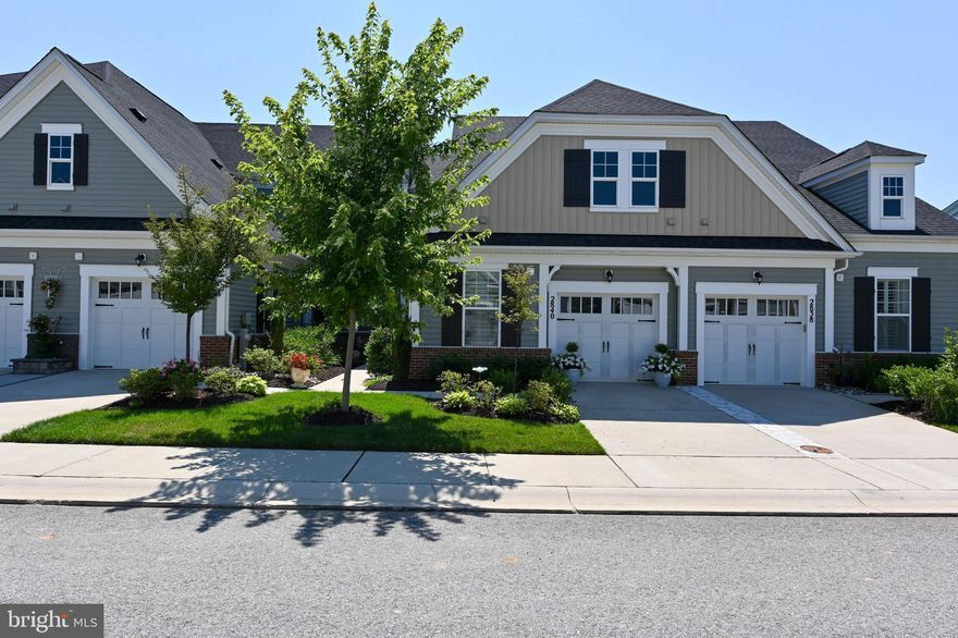 Welcome to The Anne! A gorgeous villa-style home located in the Watershed at Two Rivers; a 55+ amenity-rich community in the heart of Anne Arundel County!  An inviting home inside & out!  Blooming landscaped borders and courtyard-style entry greet you as you approach 2840 Dragon Fly Way. This home boasts a spacious & open floor plan throughout. Beautiful gourmet kitchen with 42" cabinets, granite countertops, kitchen island with large sink & gas stove -a chef's delight!  The sun-filled living room and dining area open up from the kitchen allowing easy flow for entertaining friends and family. The outdoor living space is easily accessible from the living room.  Step outside and enjoy the covered outdoor patio within your fully fenced & private custom-designed backyard oasis with perennial gardens full of color and beauty year-round!  A premium lot that abuts open space just beyond the fenceline. Enjoy main-level living in this home! The Owner's bedroom with ensuite, the guest bedroom, a 2nd full bathroom, the laundry center & storage area -are all on the first floor! The upper level offers a spacious loft & alcove area as well as a large storage room.  Use this charming loft space for your home office or library, a second recreation/living room, or even an amazing sewing & crafting space...so many possibilities! Additional features include custom wide-slat plantation shutters on every window, wide plank wood flooring, Vintage home security system, and a one-car garage. The Two Rivers community amenities are nearly endless: an indoor heated and outdoor resort-style pool, an exercise room, yoga studio, group fitness room, pickleball courts, tennis courts, basketball courts, walking/jogging trails, a dog park, hiking/biking trails with access to the WB&A bike trail, plus a community garden! Throw your very own Gala in the ballroom! Host a business meeting in the conference area, or relax in the lounge.  The community clubhouse is a spacious 15,000sq' recreational facility and is available to you for any occasion! So many amenities, plus the social gatherings planned throughout the year. WOW!  Two Rivers is nicely tucked away from the hustle & bustle, yet mere minutes to multiple grocery stores, shopping galore, tons of restaurant options, and easy access to all major routes/highways to Annapolis, Baltimore, D.C, and Marc Trains! Only one resident must be 55+  NOTE: Square footage in the tax record is incorrect. It should read 1,614 sq. ft.