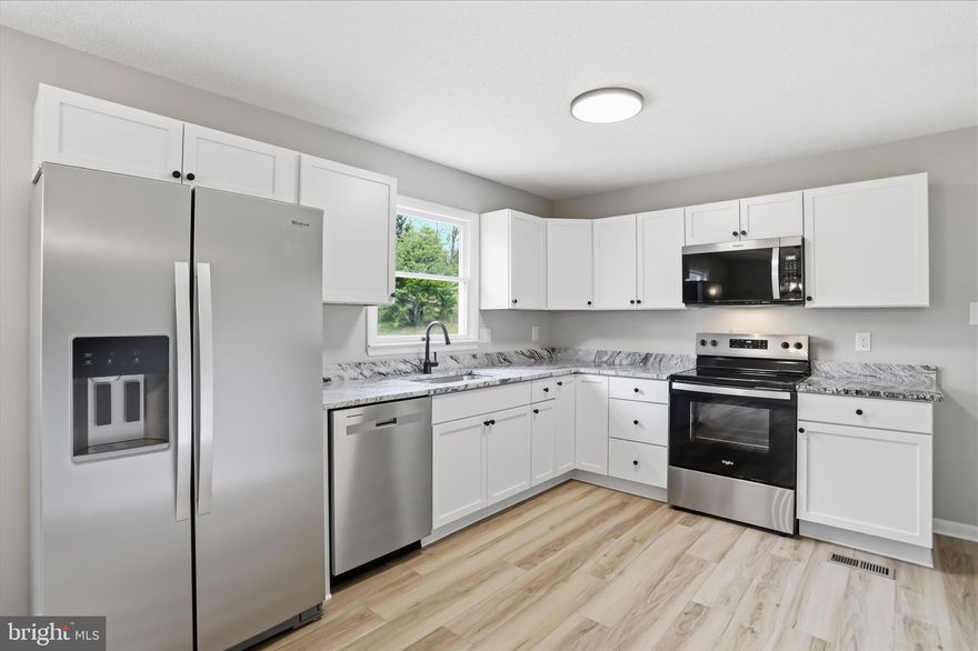 Welcome to this beautifully fully renovated 3-bedroom, 2-bath rancher nestled on 1.53 acres in a peaceful country setting. This move-in-ready home features a brand-new kitchen complete with modern cabinetry, granite countertops, and stainless steel appliances—perfect for both everyday living and entertaining.

Both bathrooms have been completely updated from top to bottom with stylish, high-quality finishes. Throughout the home, you’ll find new light fixtures, new LVP flooring, updated plumbing, and a brand-new HVAC system, offering comfort and peace of mind for years to come.

The finished basement provides additional living space, ideal for a family room, home office, or recreation area. Outside, enjoy plenty of room to spread out with a spacious yard, perfect for relaxing, gardening, or gatherings.

Conveniently located, this home offers the perfect blend of quiet country living with easy access to nearby amenities.