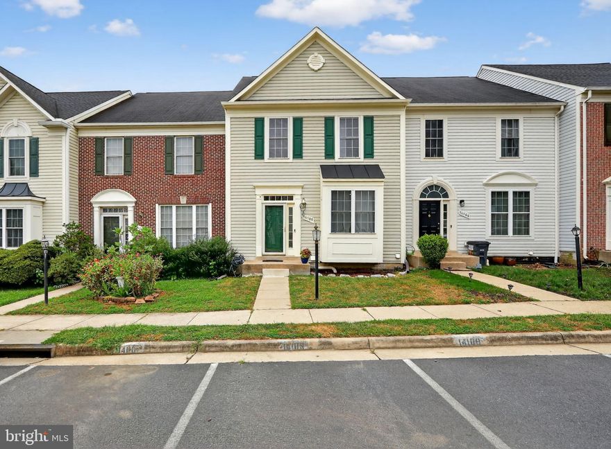 Stylish with loads of space and a location that truly can’t be beat- welcome to 14108 Madrigal Dr! This 4-bedroom, 3.5-bath townhome is tucked in a vibrant community with a pool, basketball and tennis courts, as well as multiple playgrounds; everything you need is right outside your door. You're less than 10 minutes to I-95, about 2 miles to Potomac Mills, and just 5 miles to the Woodbridge VRE—making commuting, shopping, and dining super convenient.

Inside, the open floor plan and hardwood floors through out the main level create a warm, inviting space. The living room features crown molding, chair rail, and recessed lighting for that extra polished look. The kitchen is both stylish and super functional—white cabinets and granite countertops give it a bright, modern feel, while stainless steel appliances and gas cooking make it a great spot to whip up meals for family and friends. There’s an island for prepping or grabbing a quick bite and little touches like recessed lighting, crown molding and a custom tile backsplash that add character. The dining area is the perfect size for sharing meals together.

Upstairs, the peaceful primary bedroom has an airy vaulted ceiling with a ceiling fan, and a luxurious en suite bath complete with a jetted tub, tiled shower, and double vanity. Two additional carpeted bedrooms share a hall bath with a tiled tub surround.

The walk-out basement gives you even more living space with a recreation room featuring a gas fireplace, a full bathroom with LVP flooring & a tiled shower/tub, and a bonus room —perfect as a home office, gym, or 4th bedroom.

Step outside to the deck that overlooks the backyard with peaceful wooded views. It’s the perfect spot to enjoy your morning coffee or relax at the end of the day. The fully fenced yard with wood privacy fencing makes it a great space for entertaining too!

This townhome checks all the boxes—location, updates, living space, and community perks. Come see what makes this one a standout!
Some photos have been virtually staged to help illustrate the potential use and layout of the spaces