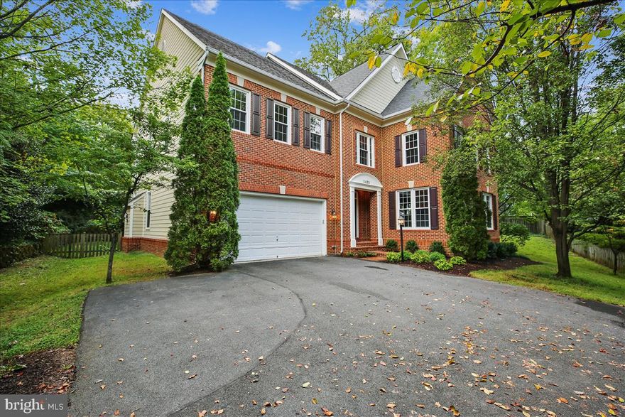 This fabulous brick colonial is situated on an over-sized 13,000 sq. ft. lot, in the highly sought after Alta Vista subdivision. This home features over 5,000 sq. ft. of living space over 3 levels with 4/5 bedrooms and 4.5 bathrooms, an attached 2 car garage, and boasts gleaming hardwood flooring throughout both the main and bedroom levels. The elegant interior demonstrates tasteful finishes, crown molding, soaring ceilings, walls of windows, and recessed lighting throughout. Designed for entertaining with an open floor plan, the entry flows into the expansive living and dining areas surrounded by tall windows overlooking park-like gardens. The large eat-in kitchen has a SubZero refrigerator/freezer, granite counters and it opens to a large breakfast area which accesses the rear patio, and the Great Room with its high ceilings, gas fireplace, and a wall of tall windows. The grand staircase leads to a broad upper hallway providing access to 4/5 bedrooms and the upstairs laundry room. The Master Suite includes a tray ceiling and recessed lighting, a master bathroom with corner jet bath, separate his/hers vanities, and a separate over sized shower. The suite also includes a walk-in closet. Office with built-ins. A 2nd large bedroom includes an en suite bathroom, and the final two bedrooms share a Jack & Jill bathroom. The home's Lower Level is not to be missed with high ceilings, an expansive Recreation Room, full bath, large Fitness/Media Room and storage room with walk-up entrance to the rear yard. This home has also been freshly painted and had new carpeting installed. Easy access to I-495, I-270, walking distance to the YMCA and close to Downtown Bethesda. In the Walter Johnson High School District.