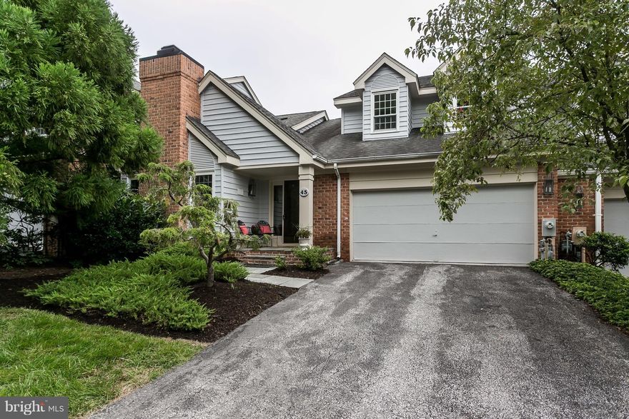 Rarely available 1st floor master with hardwood throughout the entire house.  New windows, sliders, dishwasher and oven.  Fresh paint throughout. Den w/ wood burning fireplace off kitchen. Bright LR w/ vaulted ceilings, wood burning fireplace and slider to fenced bluestone patio.  Sitting room overlooking LR.  2 large bedrooms upstairs w/ lots of closet space.  One year HMS Warranty included.