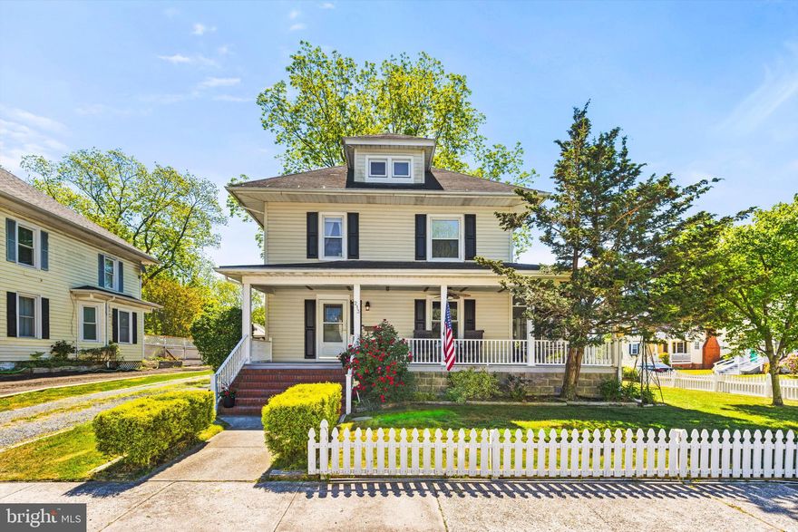 On a quiet back street corner, this charming Craftsman Four Square home welcomes you with timeless appeal. A white picket fence frames the yard, accented by boxwood hedges and mature shade trees—an ideal setting for play, pets, gatherings, or simply enjoying a peaceful afternoon. The wrap-around porch invites you to slow down, whether you’re sipping morning coffee, sharing dinner in the evening breeze, or greeting neighbors as the sun sets.
Step inside to a gracious formal entryway, where beautiful hardwood floors immediately draw you in and continue throughout the home. A classic newel post and railing lead upstairs, while the main level opens into a spacious, light-filled living room with oversized windows offering lovely views. The open flow continues into the formal dining room, where a corner gas fireplace and abundant natural light create the perfect backdrop for meaningful meals and conversation.
A breakfast bar connects the dining space to the large country kitchen, creating a warm and inviting hub where everyone naturally gathers—just as the aroma of home cooking fills the air.
Upstairs, three bright and airy bedrooms provide peaceful retreats. Sunlight filters through long, flowing curtains, creating a soft, relaxing atmosphere—perfect for quiet afternoons or restful evenings. A well-appointed full bath and ample storage add everyday convenience, while a single-car garage offers additional space.
Located in the heart of Pocomoke City, this home offers the charm of a close-knit community with easy access to some of the region’s most loved coastal destinations. Local dining, shopping, and year-round events are just minutes away.
This isn’t just a house—it’s the lifestyle you’ve been waiting for.