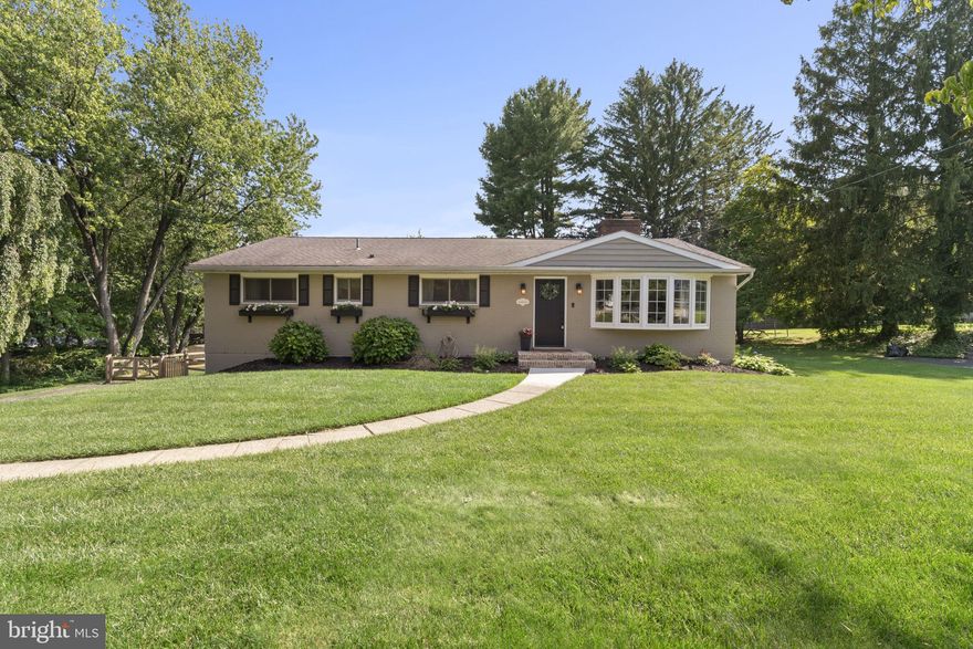 Welcome to 135 Conestoga Road - a rare beautifully updated ranch-style home in coveted Great Valley schools. Perfect one floor living, and located on a large flat lot, the front of the home features gorgeous window boxes, meticulous landscaping, and a new brick entryway. Entering the home, the sundrenched family room showcases new hardwood floors, vaulted ceilings, a gorgeous floor to ceiling wood burning fireplace, and large bay window. The renovated kitchen highlights white cabinets, white subway tile backsplash, black granite countertops, and a center island. The kitchen opens to the sunny dining room, perfect for hosting family and friends. To the left of the entryway, you'll find 4 bedrooms and a freshly updated hall bath. The primary suite contains its own updated bath with tiled shower and a private deck for your morning coffee. Heading to the lower level, you'll find a large finished basement with ample space for a secondary family room and game room. The storage area with washer, dryer, utility sink, and a large 2-car garage complete this lower level. In the newly fenced backyard you'll love the enormous deck with pergola, perfect for family cookouts, plus the large flat yard for those family ball games. Located within minutes to Wegmans, Target, Starbucks, Chick-fil-A, 202 and major roadways, this location is ideal. Don't delay. This picture perfect home is the ONE.