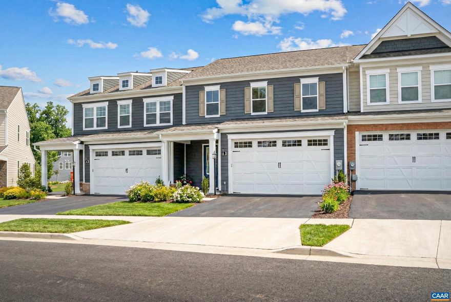 This modern, low-maintenance 2023 luxury townhome features an open layout, complete with a chef?s kitchen boasting sleek quartz counters, stainless steel appliances, premium custom cabinetry, and a spacious island that seamlessly flows into the living and dining areas. Abundant natural sunlight fills the home throughout the day, enhancing its warm, inviting atmosphere, and highlighting its contemporary design. The main-level primary suite offers convenient one-floor living, while the upstairs loft, two bedrooms, and office provide perfect space for work or play. With a two-car garage, energy-efficient construction, and exterior maintenance covered by the HOA, you?ll enjoy comfort and convenience year-round Location is just minutes from shopping, dining, and top Albemarle County schools. Conveniently located to NGIC, Albemarle airport, and 20 minutes from UVA. This home delivers modern living in an unbeatable Charlottesville location,Painted Cabinets,Quartz Counter,Solid Surface Counter,White Cabinets