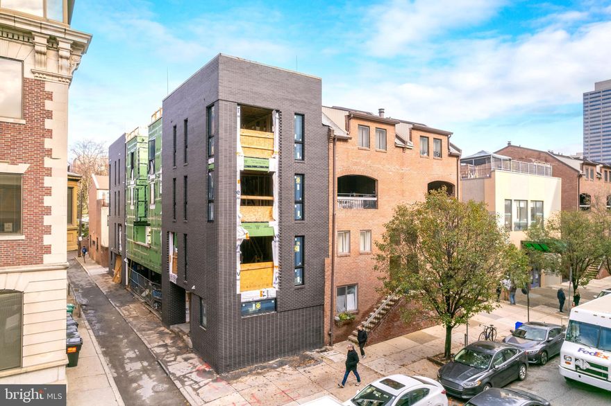 The Duo on Arch is a progressively designed pair of CORNER homes built in one of the Philadelphia's premier neighborhoods - Logan Square - featuring TWO car parking! These stunning homes will capture you from the moment you walk up. The handsome charcoal exterior will be contrasted by a stunning pivoted natural wood door. Upon entry you will walk into a nicely designed foyer space along with the 4th bedroom and full bathroom which could be a perfect office set up. The second floor is a wide open layout with a massive kitchen featuring custom Porcelanosa cabinetry, Bosch appliances and quartz counters as well as backsplash. The kitchen also leads you to your private deck allowing outdoor entertainment right off the main living area! Pass through the dining room into the expansive living room that is sun soaked. The sleek and modern corner fireplace captures your focal point while leaving plenty of space for furniture arrangement. The third floor conveniently holds the primary suite with huge bedroom, massive closet and a stunning designer bathroom with wet room, freestanding tub and double vanity. The fourth floor features two graciously sized bedrooms and beautiful bathrooms, plus laundry and wet bar. Last but not least, the stunning roof deck with perfect skyline views! Schedule your tour now - delivery Spring 2023. These homes include the FULL tax abatement applied for. *Association fees are TBD. It is the responsibility of the buyer to verify square footage and taxes.