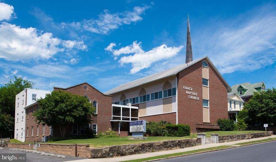 Great Cumberland downtown business location situated on 5 parcels, Mountain Side Maryland at it's best, high traffic and visibility, full corner access, previously used for a church organization yet endless possibilities.  Most of the value is within the land, however the building has been maintained.  The seller has disclosed  some water intrusion in the basement area during very heavy rains.  The main level in handicap accessible. Main auditorium 70'x55" additional Chapel 49'x26'.