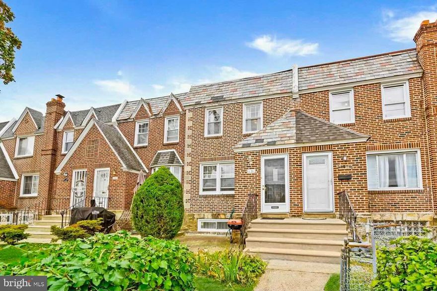 Meticulously maintained and thoughtfully updated, 1151 E. Dorset St. offers the perfect blend of warmth, function, and style in the sought-after Mt. Airy neighborhood of Philadelphia. This three-bedroom, one-and-a-half-bath home welcomes you with a sun-drenched living room that flows seamlessly into a formal dining space and a beautifully renovated kitchen featuring two-tone cabinetry, quartz-style countertops, stainless steel appliances, and a stylish modern backsplash. Upstairs, you’ll find three generously sized bedrooms and a tastefully updated full bathroom with designer tile and glass shower doors. The finished basement expands your living space with room for a home office, gym, or playroom and includes a convenient half bath, laundry area, walkout access to the rear of the property, and an attached one-car garage. Rich hardwood floors, recessed lighting, and timeless trim details add elegance throughout. Nestled on a quiet street but just minutes from shopping, public transportation, and commuter routes, this Mt. Airy gem combines peaceful living with everyday convenience.