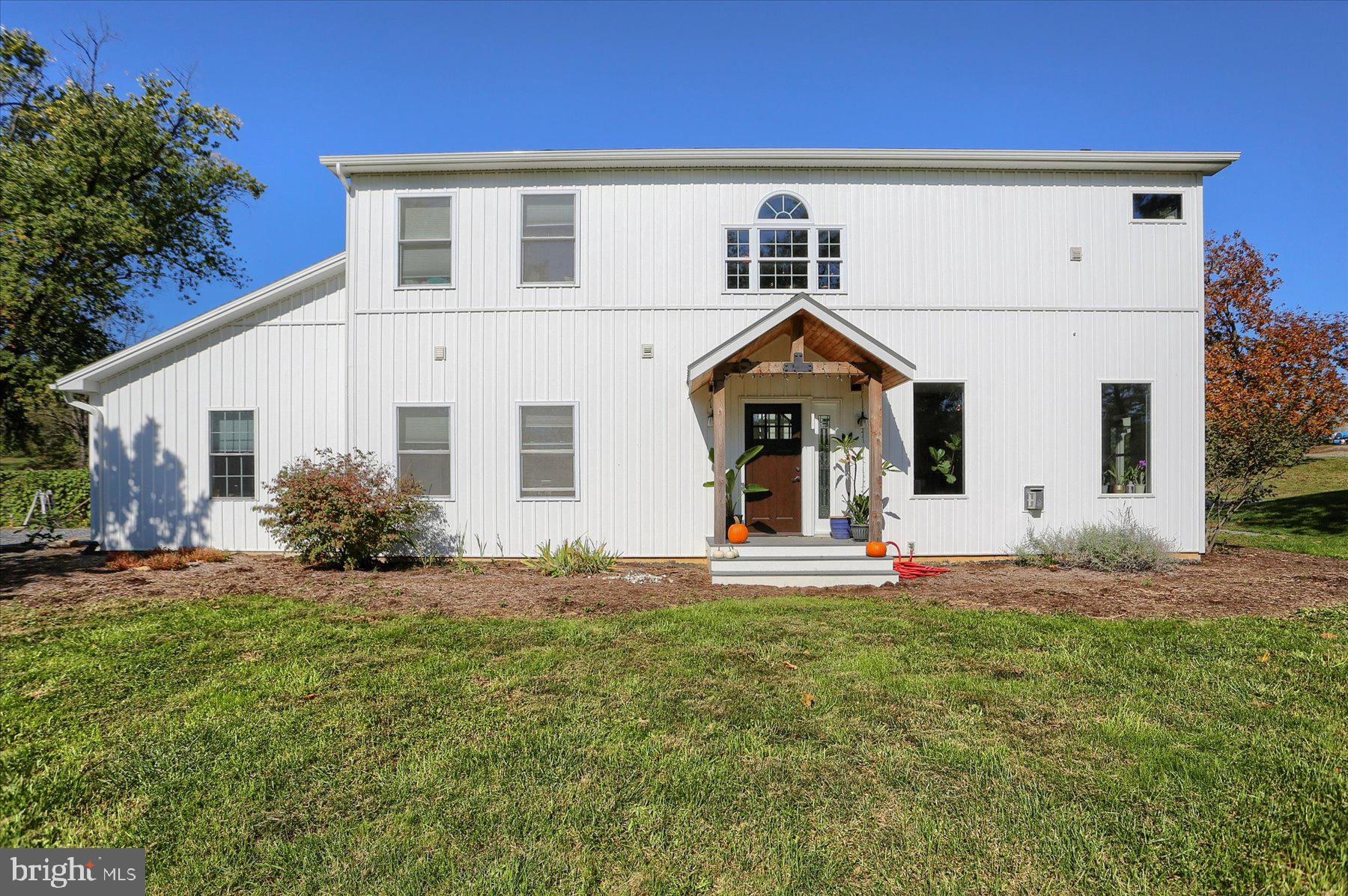 Nestled in a picturesque setting in the Cumberland Valley School District, you will find this lovely 4 bedroom, 3 and 1 half bathroom home located just outside of the historic towns of Boiling Springs and Churchtown. There is a definite small-town feel that still provides easy access to all of the area amenities - fine dining, shopping, medical facilities, Rtes. 81 and 15, and more. The home is located 2 minutes from Boiling Springs, 10 minutes to downtown Carlisle, Mechanicsburg or Dillsburg and 20 minutes from Harrisburg. The home was built in 2014 and has been lovingly maintained and offers 2,200 square feet of thoughtfully designed living spaces throughout and includes an in-law suite with a separate driveway and entrance. An upgraded kitchen, which is the heart of this home, has stainless steel appliances and tons of prep space, storage space, and a large walk-in pantry for added convenience. The breakfast area is flooded with light from the sliding glass doors that lead to a covered patio, perfect for combining the outside space with the inside space. Adjacent to the kitchen and breakfast area is an expansive family room that overlooks a 3-acre front yard complete with a "bubbling" spring and has a cozy gas fireplace which makes this open floor plan perfect for hosting memorable gatherings with family and friends. Upstairs are 3 spacious bedrooms, including a primary suite featuring a huge walk-in closet with laundry facilities and lovely en-suite bathroom offering a spa-like retreat. A 2nd full bath on this level is great for guests or family. The main floor in-law suite with a separate entrance, bedroom, full bath and living area offers easy access for guests or multi-generational living. Geothermal heating with central air insures highly efficient conditioning of the home. This property offers 42 acres that provide unlimited opportunities for all of your outdoor pursuits. The barn and the detached oversized three-car garage provide ample storage space for cars and toys or plenty of space for the avid hobbyist, mechanical enthusiast or car buff. Also located within 2 hours of Philadelphia, Baltimore and DC, and just 3.5 hours to NYC, this could be a dream getaway destination or horse farm. The current owners have organically farmed the property for the past 15 years (note: the farm is not a certified organic farm) and there is an irrigation system and miscellaneous other equipment - greenhouses are negotiable - if the purchaser wants to purchase a working farm. This great property would be the perfect place to call home!