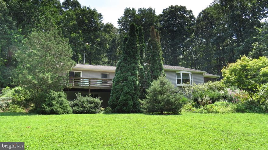 Tranquility awaits!  This spacious 3 bed, 2.5 bath ranch home sits on a private 3 acre lot in Southern Lancaster County.  The large open family room leads out to the screened covered porch.  The first floor offers 2 bedrooms while the lower level provides a private master suite with propane morning stove.  Plenty of storage available in the unfinished portion of the lower level and the 17'x9' bonus room off the oversized 2 car garage. Don't wait to see this home!