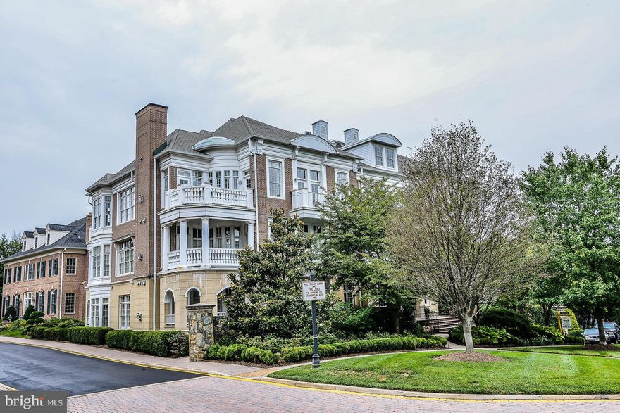 NEW PRICE! $90K REDUCTION! 1 YEAR OF PRE-PAID CONDO FEES!  Penthouse condo with soaring ceilings, a gourmet kitchen, gorgeous hardwood floors, new open floor plan & re-finished floors, den/library, gas fireplace, three balconies!  All located in a secure building in the  beautiful Evans Farm community. Minutes to DC, Tysons Corner, downtown McLean, and the Silver line.