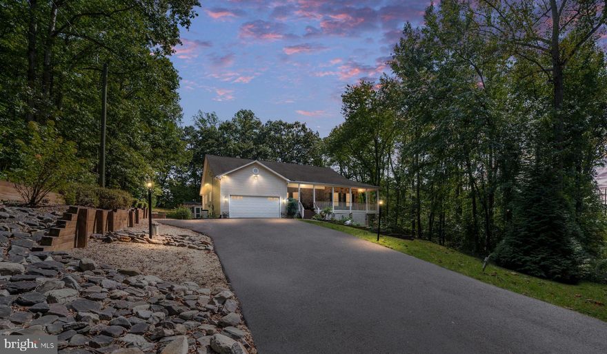 A home built with heart, designed to be loved! From the moment this custom rambler was a blank slate of land, to the first blueprint onto the final little touches, the original owner lovingly oversaw every detail of its creation ensuring that it was crafted with care, attention and pride. 

As you step onto the marine decking wraparound porch, you’re greeted by the charm of nature without the constraints of an HOA. Inside, the warmth of the home unfolds with over 4,480 finished square feet designed for both everyday living and special moments. 

The main level flows easily from room to room, filled with natural light and thoughtful touches. The kitchen, updated with beautiful quartz countertops, a reverse osmosis system, and generous pantry space has been the heart of many meals and memories. Just beyond, the sunroom invites you to slow down and take in the view, sharing a double-sided fireplace with the cozy den. It’s the perfect place to gather, laugh, and linger a little longer.

The primary suite is a true sanctuary, offering space to rest and recharge with a spa-like bath that even features a BioBidet toilet for added comfort and convenience. The main level also includes a separate office, perfect for those who work from home or simply need a quiet corner to think.
Downstairs, the fully finished lower level offers more than 2,200 square feet of flexible living space. With its own private entrance, full kitchen, bedroom, bath, laundry, cedar-lined closet, and abundant storage, it’s ideal for guests, extended family, or an in-law suite—multi-generational living at its finest.

This home was built to stand the test of time, and it shows. From the whole-house Generac Guardian 20kW generator and artesian well to the Fresh Aire UV water purifier, Nu-Tone sound system, epoxy garage floor, and marine decking on the wraparound porch, every detail was selected for comfort and longevity. Outdoor spaces are equally impressive with an inviting stamped concrete patio, a separate shed, and serene landscaping that feels private yet connected.

Located just two miles from Stafford Hospital and minutes from I-95, shopping, and dining, this home offers the best of both worlds—quiet country living with city convenience.

At the end of the day, 2286 Richmond Highway is destined to make you feel comfortable and warm, as well as your sanctuary for years to come. Come by and see how this home has been loved, maintained, and thoughtfully improved through the years and imagine where your next chapter begins within its walls.

Recent updates bring even more peace of mind: a new firebox for the dual-room fireplace (2025), freshly paved driveway and landscaping (2025), septic pump replacement (2024), quartz countertops (approx. 2022), updated tile in the guest bath (approx. 2022), and newer main-level windows with a transferable warranty (approx. 2017).